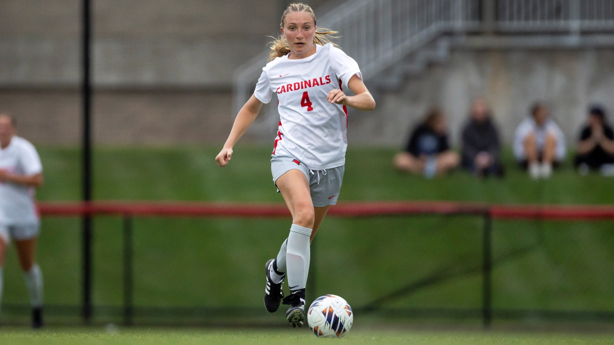Sydney Myers dribbling a soccer ball