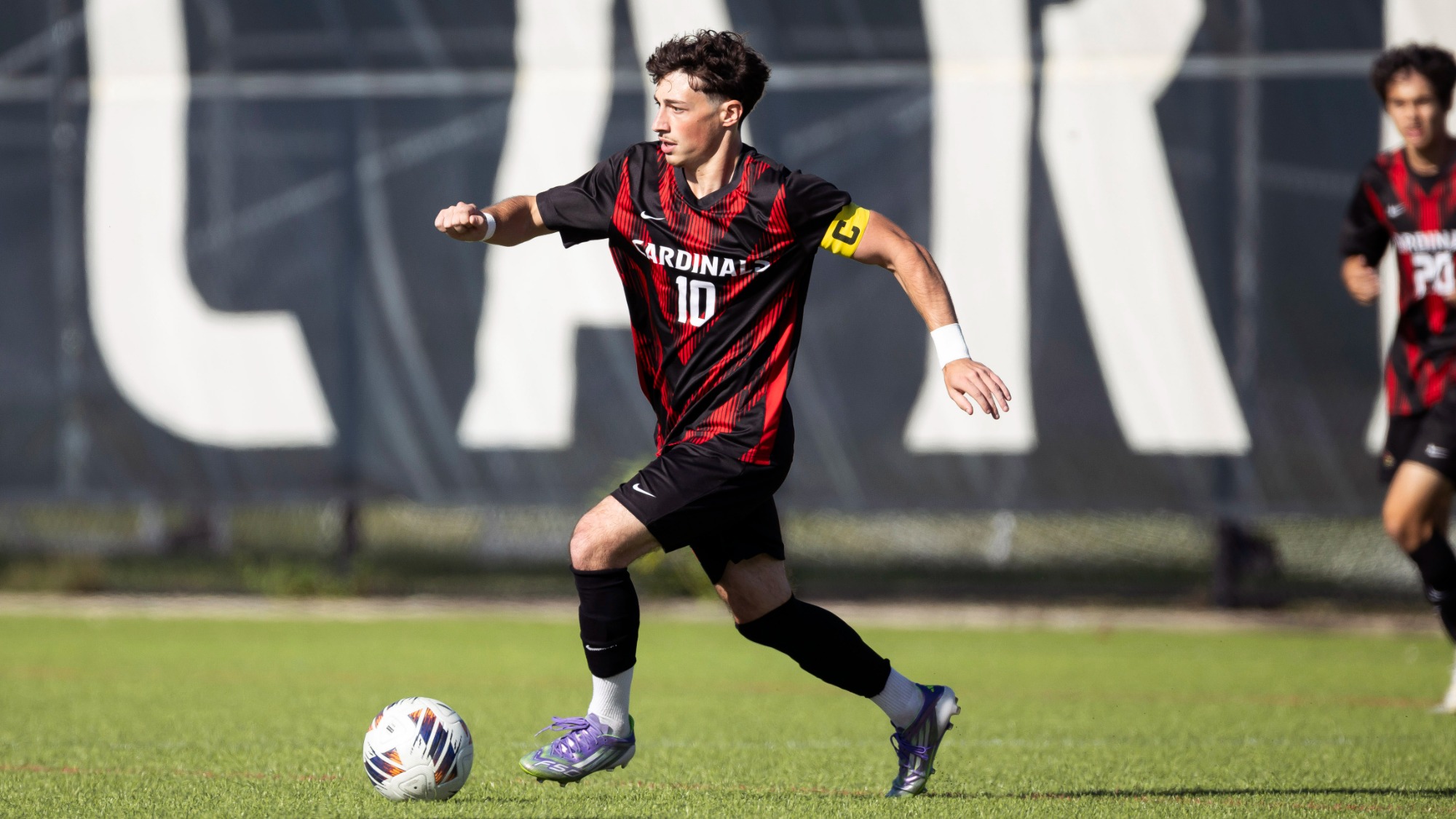 Jacob McGowan dribbling a soccer ball