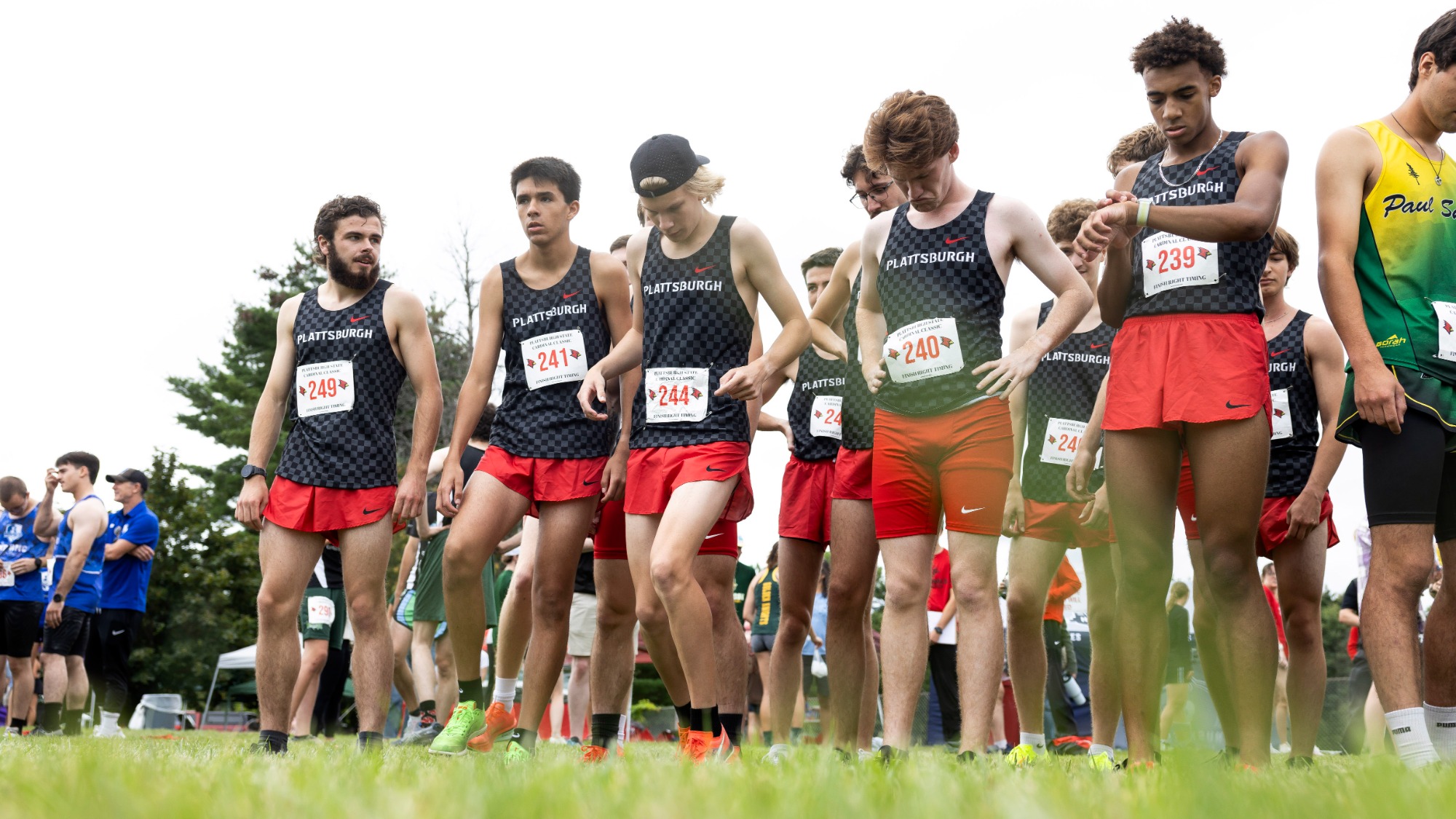 Men's Cross Country Team on start line 