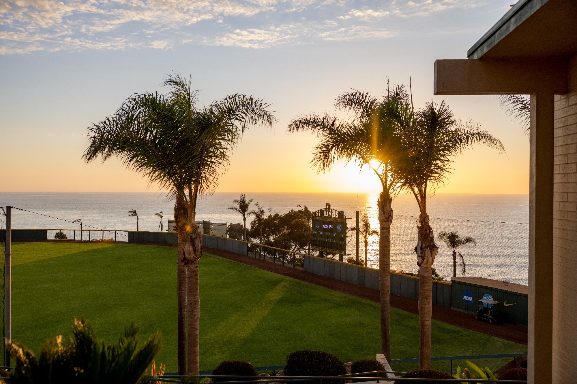 sunset, Carroll B Land Stadium, baseball field, palm trees