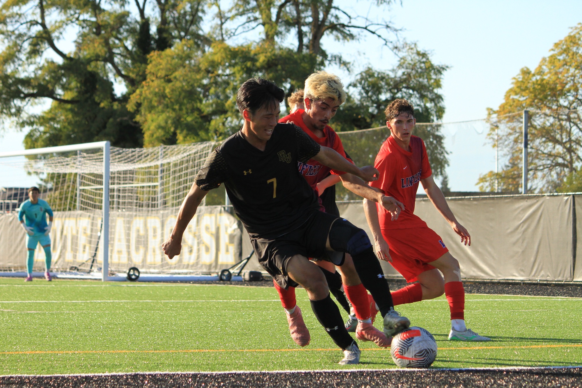 Yuta Shimazu controls the ball vs Linfield