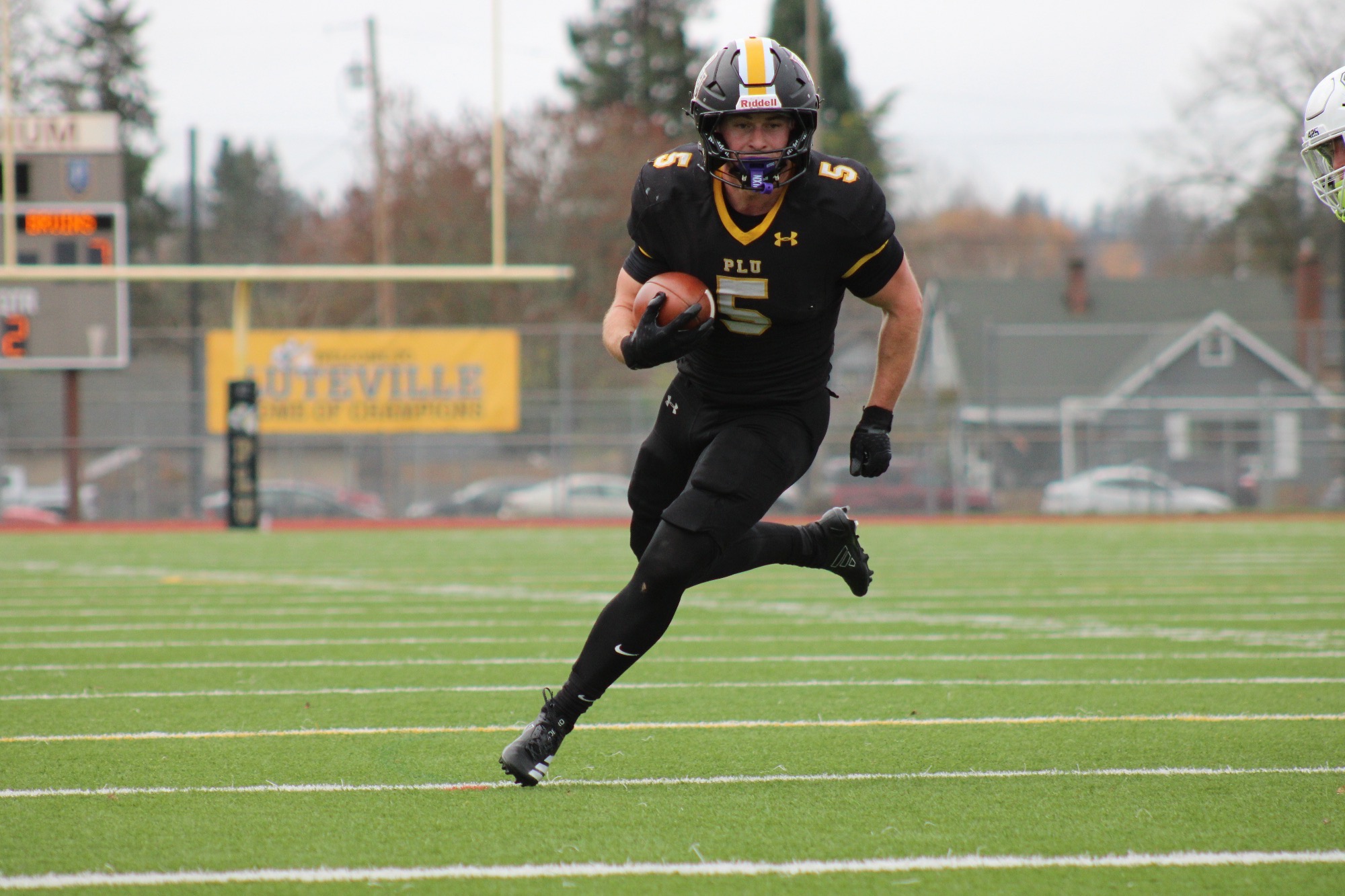 Schuh running towards the end zone in 55-21 win over GFU