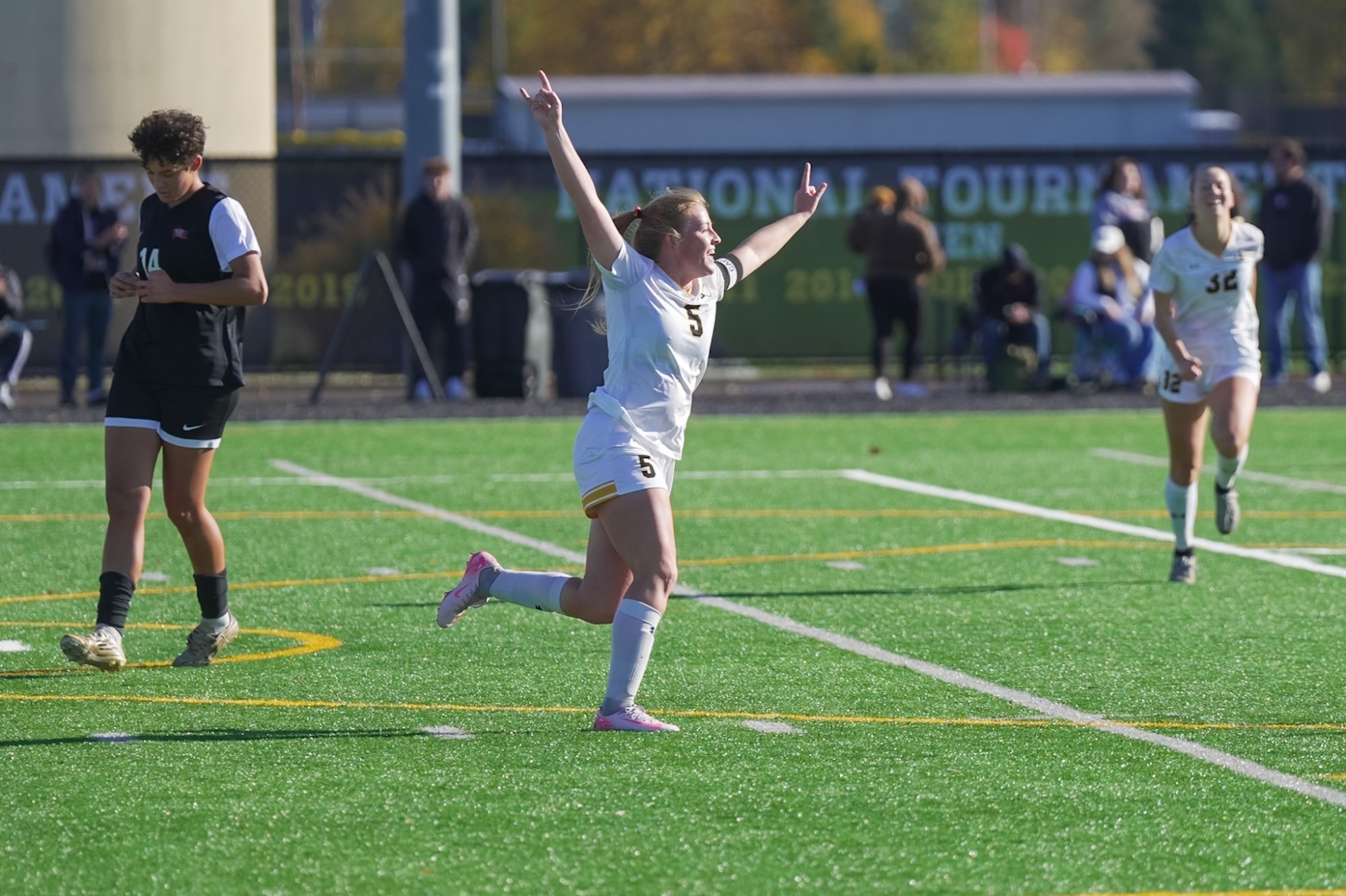 Liv Olson celebrates after scoring the first goal against Whitworth.