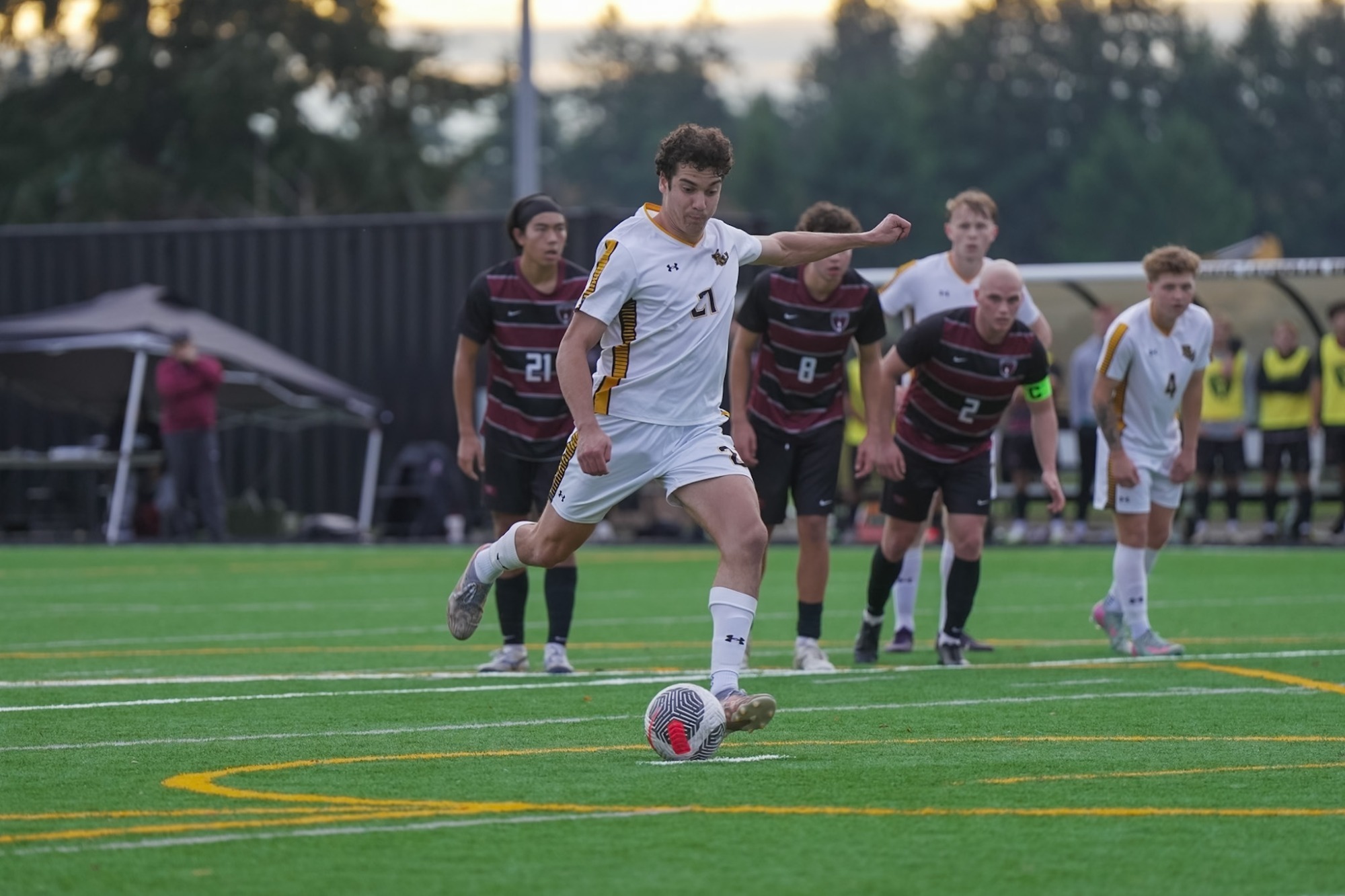 Misha Turchaninov takes the game-winning penalty kick against Whitworth.