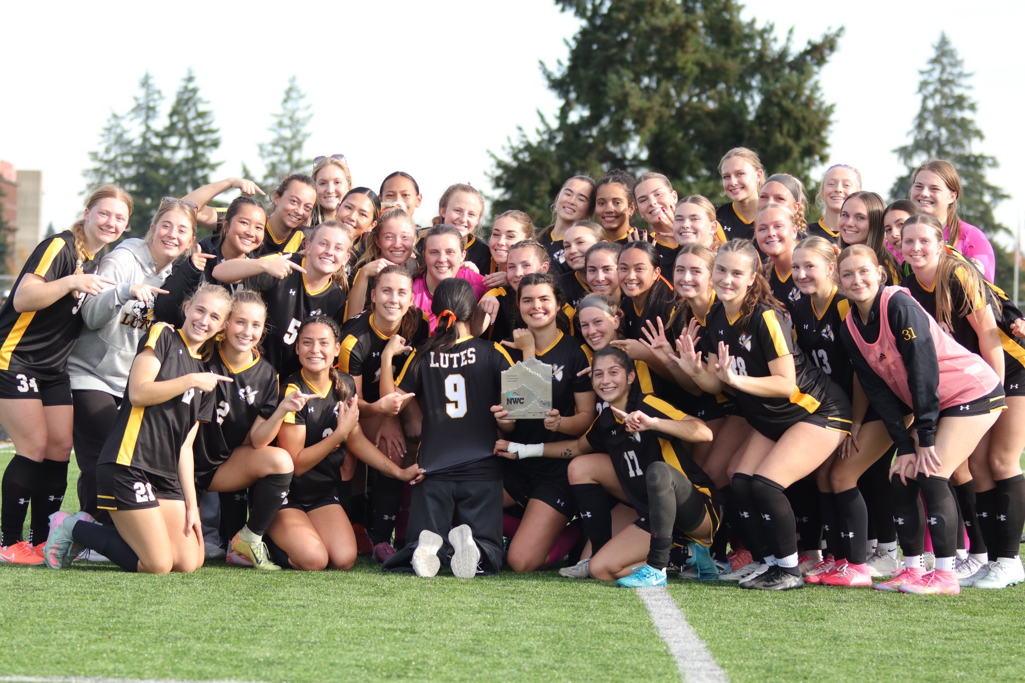Lutes celebrate 9th straight NWC championship.