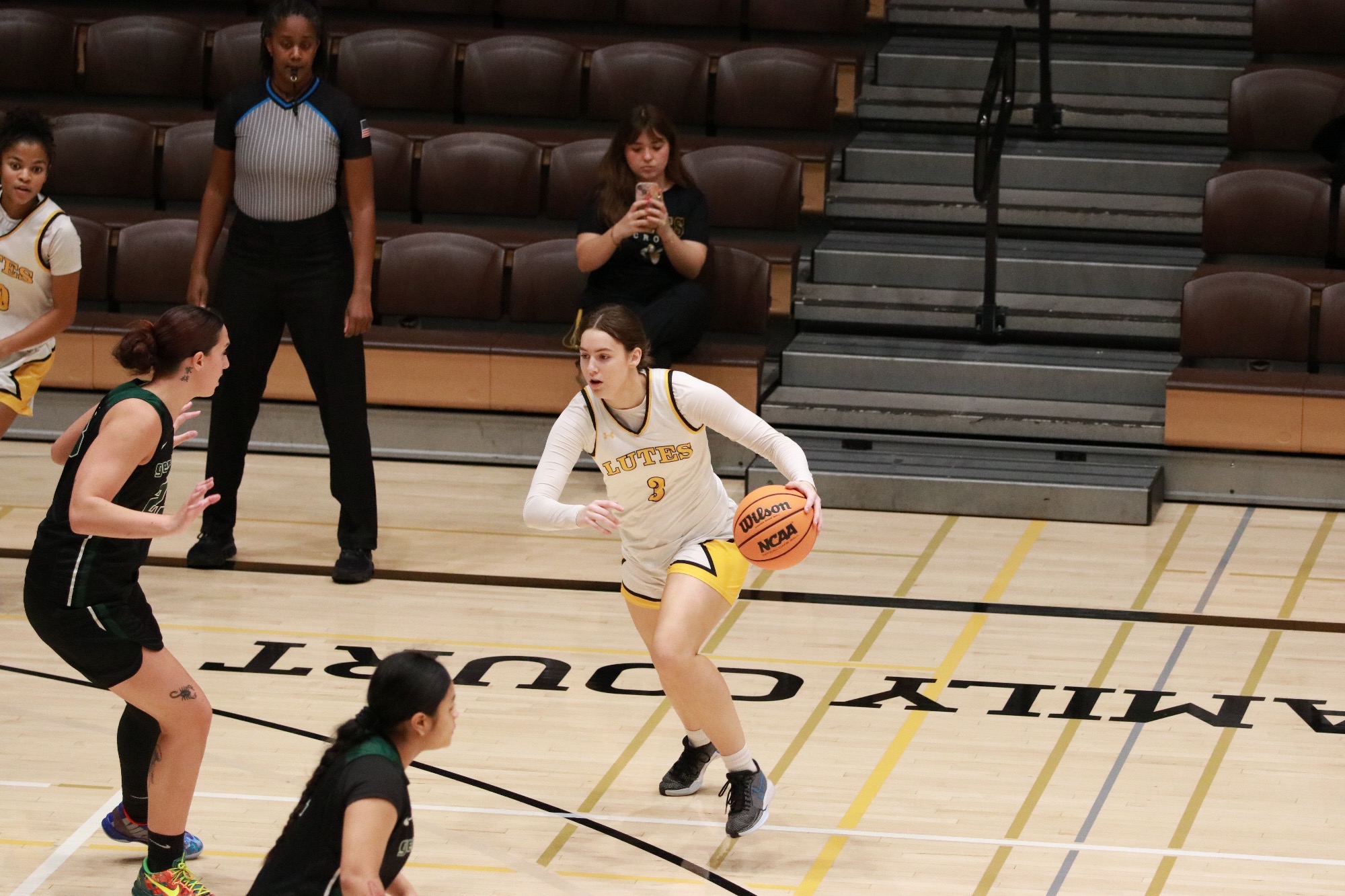 Kate Wooten dribbling vs Evergreen