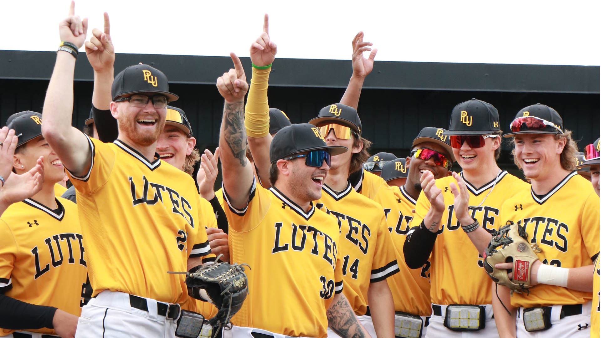 Baseball team celebrates against Chapman