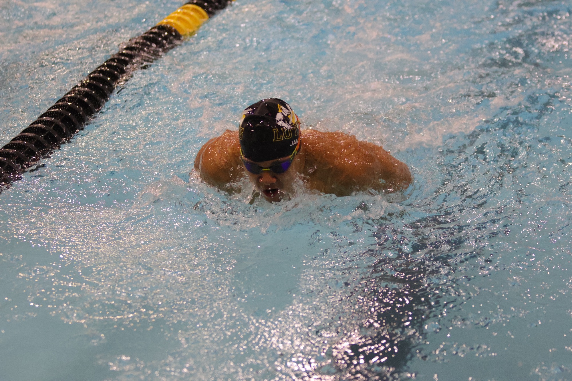 Anthony James in dual meet vs Pacific