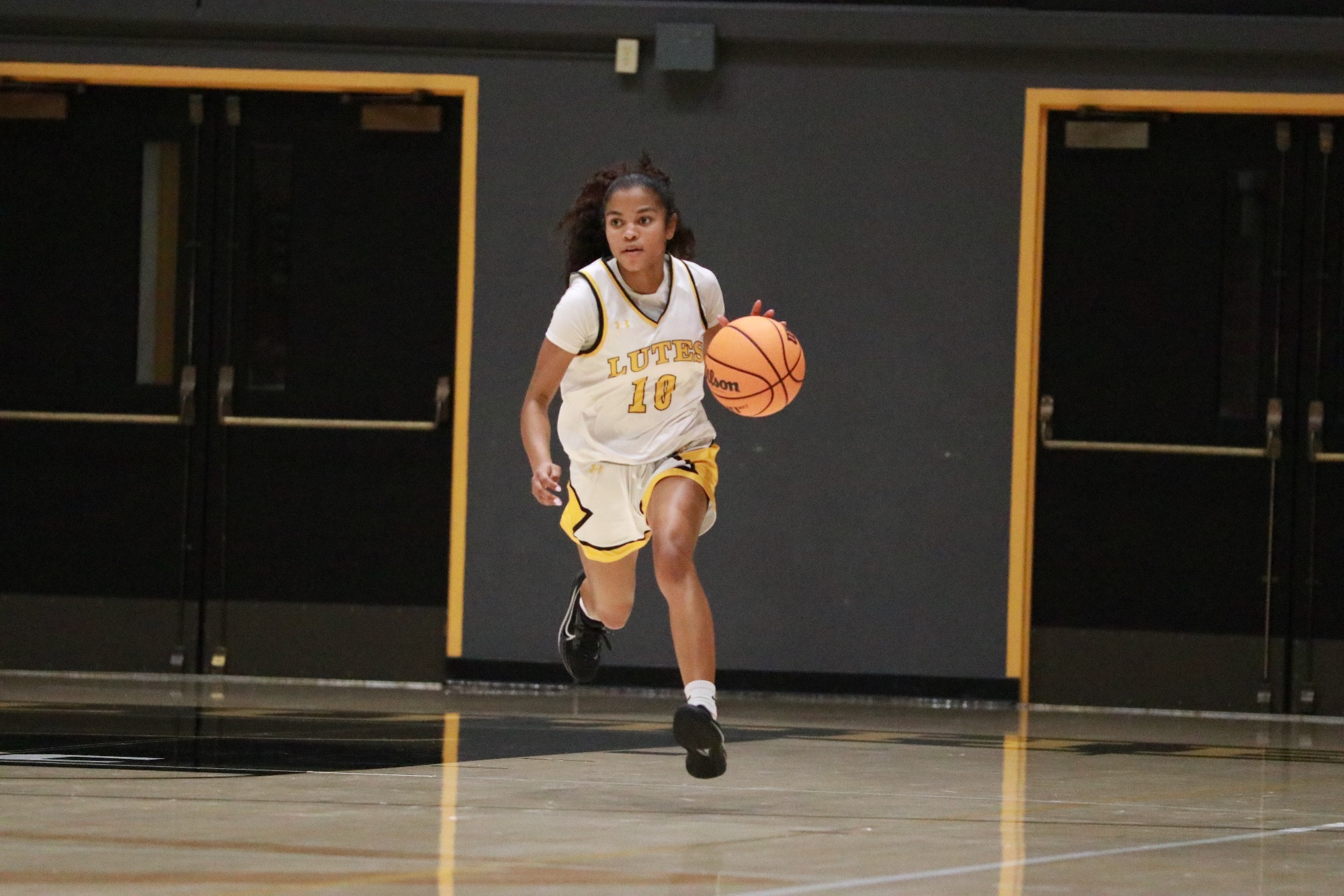 Lilli Williams dribbling ball down court vs GFU