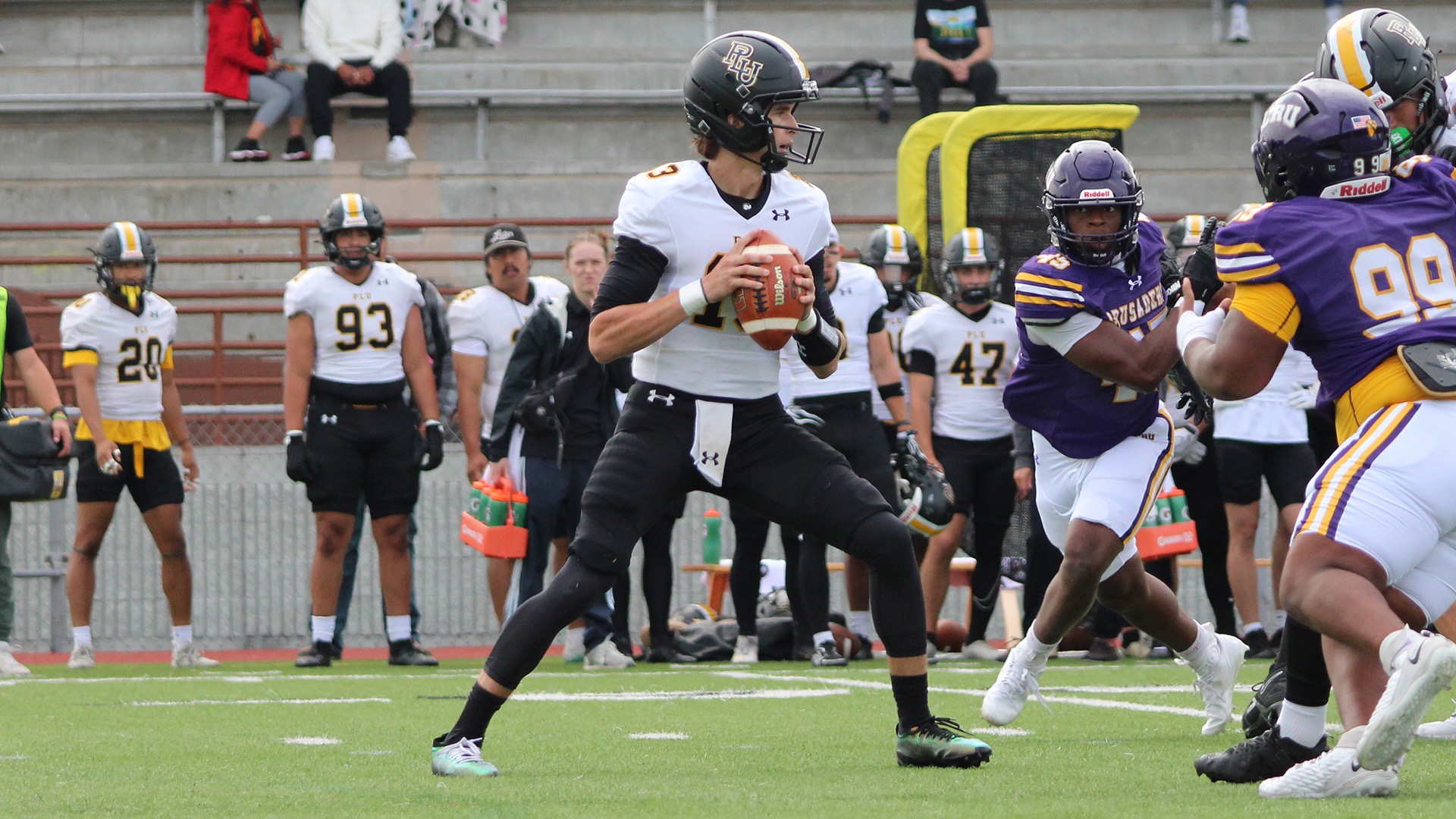 Anthony Mahaffey drops back for a pass against UMHB