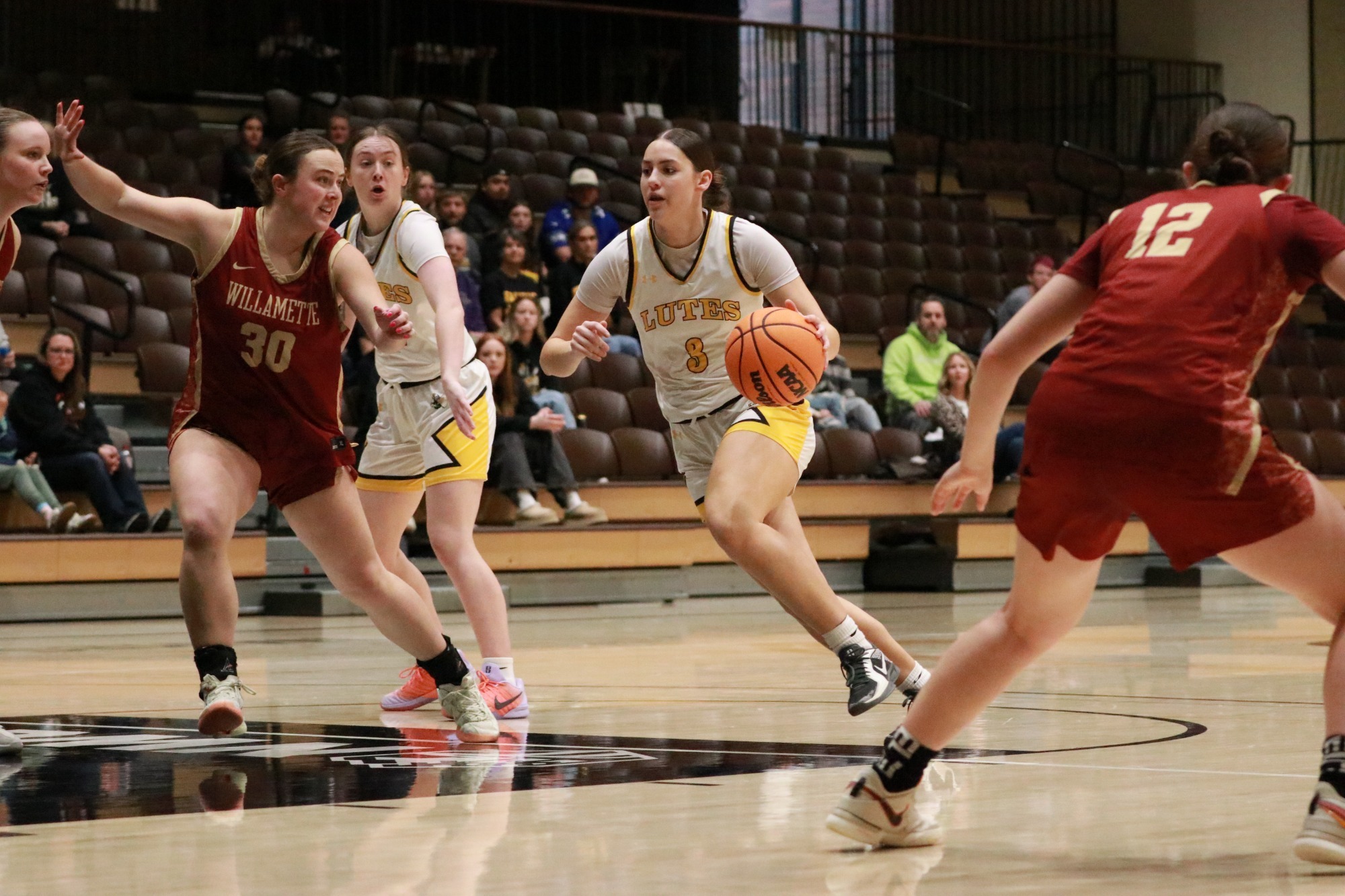 Kate Wooten dribbles past the defender