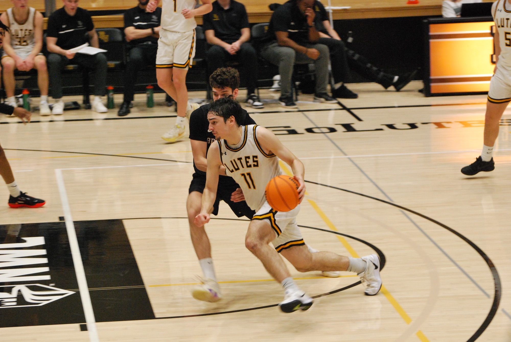 Ben Tellez drives to hoop vs Willamette