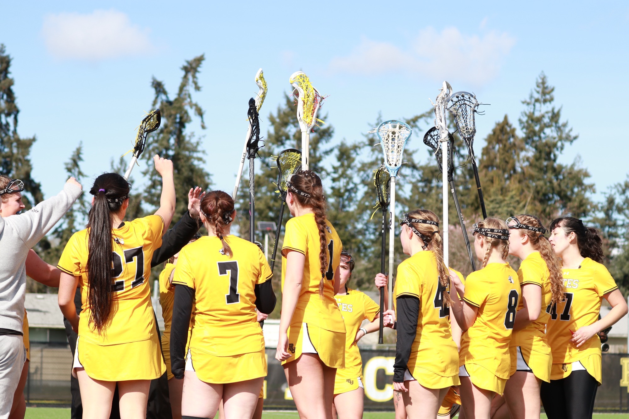 team huddle pregame vs Lewis & Clark