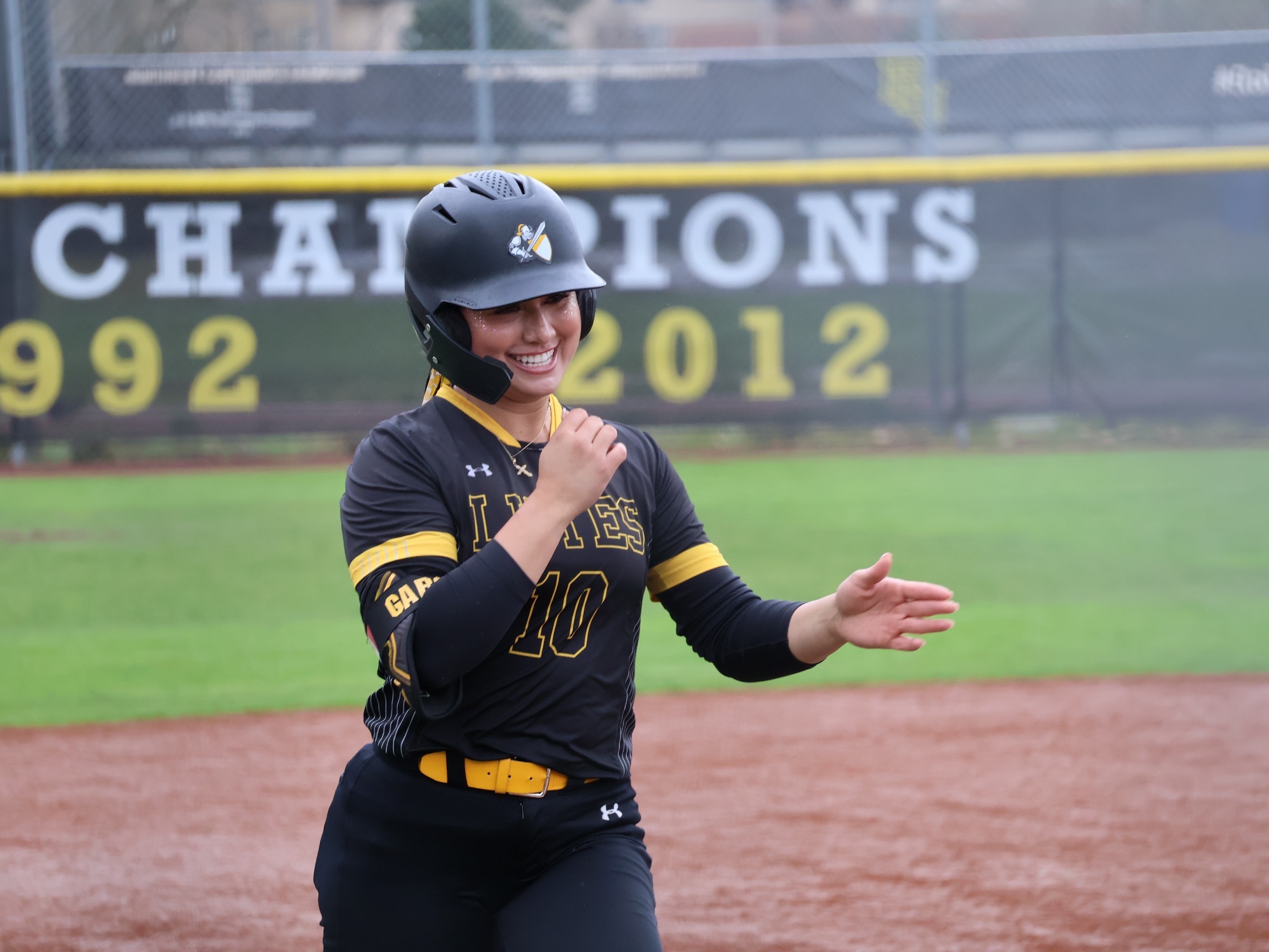 Paola Garcia running the bases versus Willamette