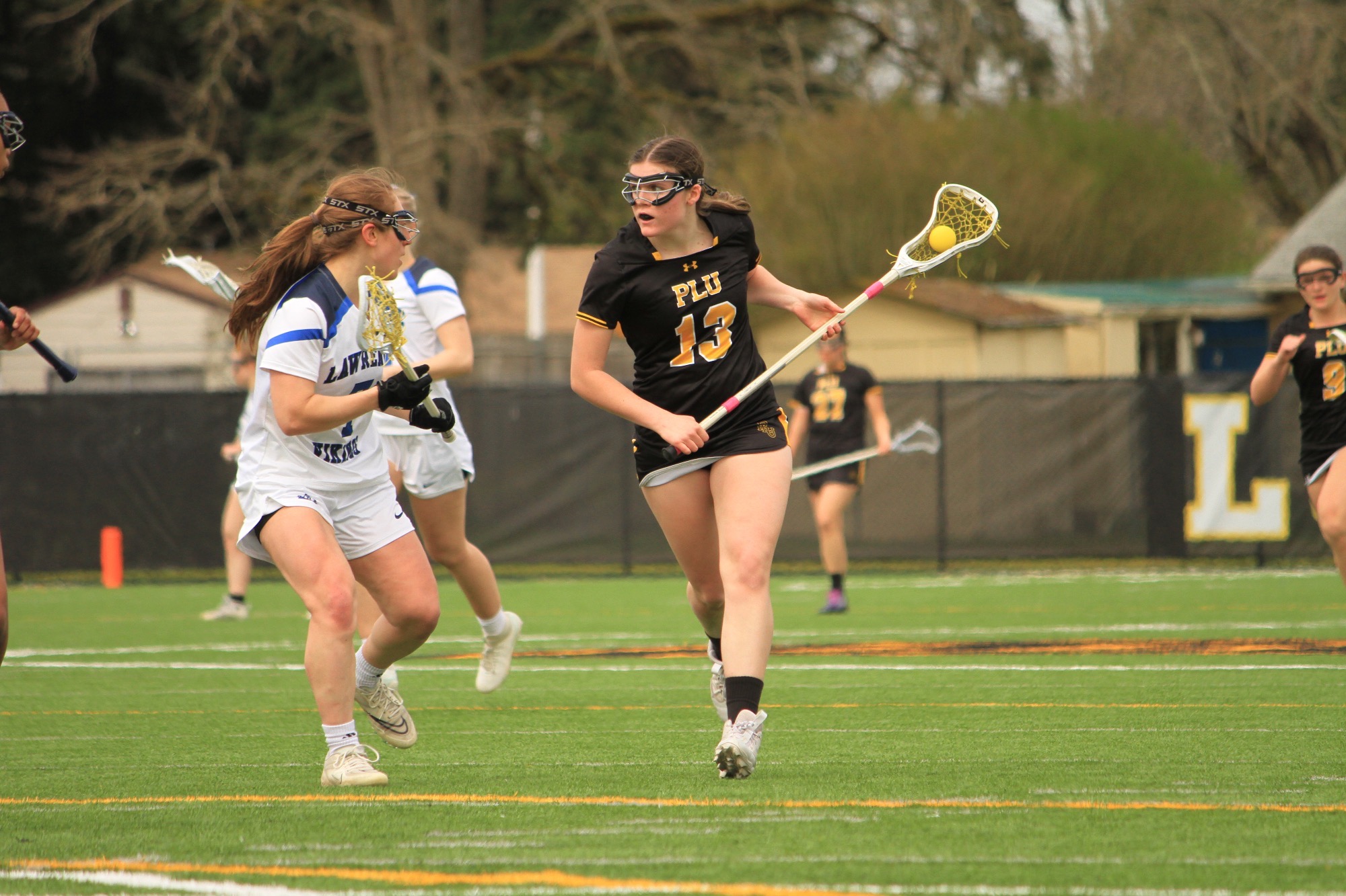 Taylee Alldredge with the ball versus Lawrence