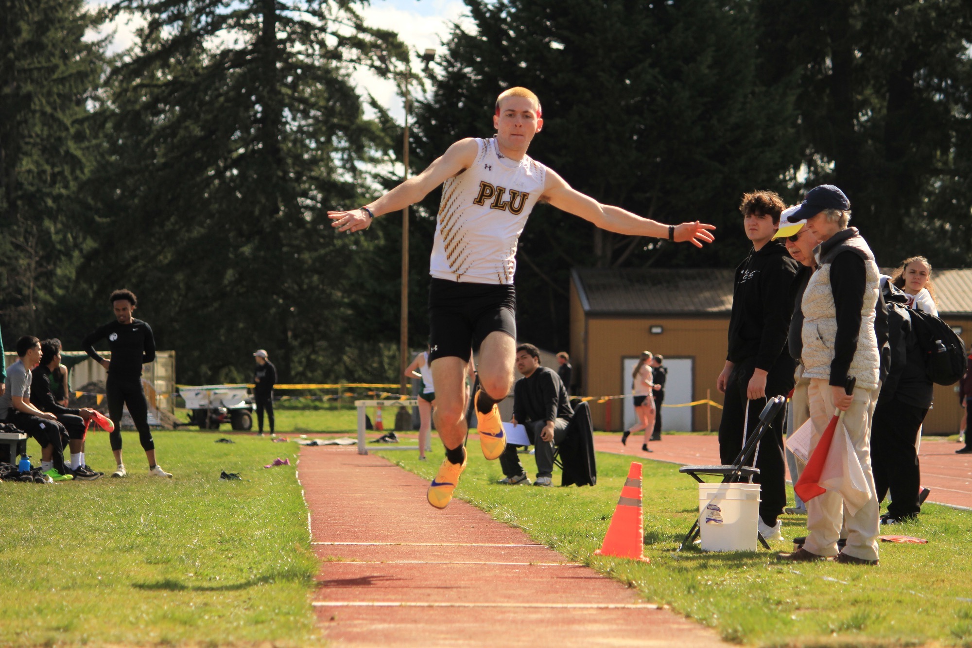 Bridger Hanis jumping at Bard Moore Invite