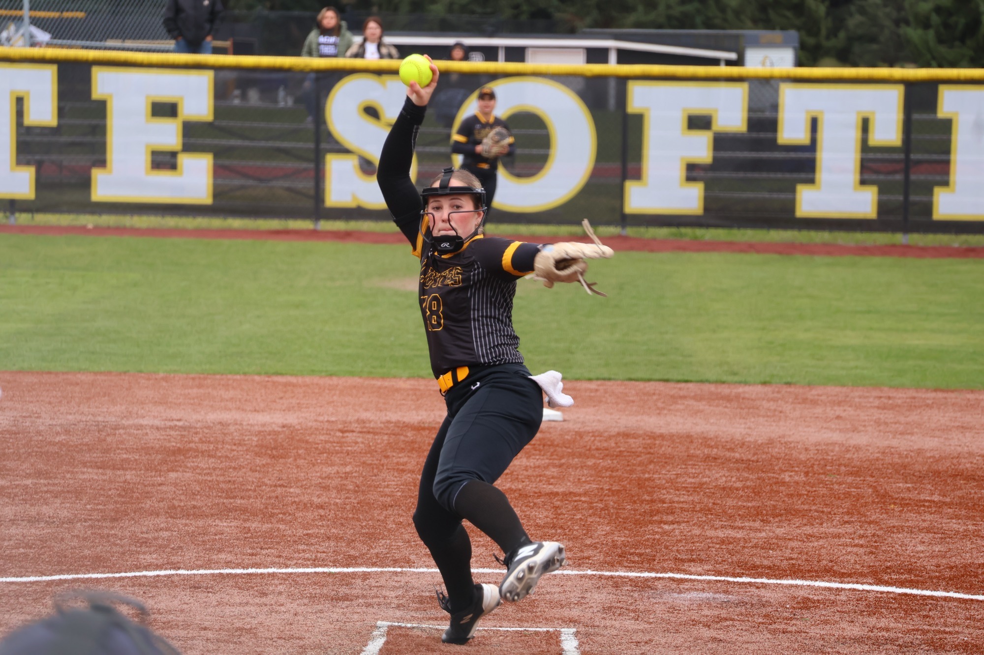 Wilson winds up for a pitch.
