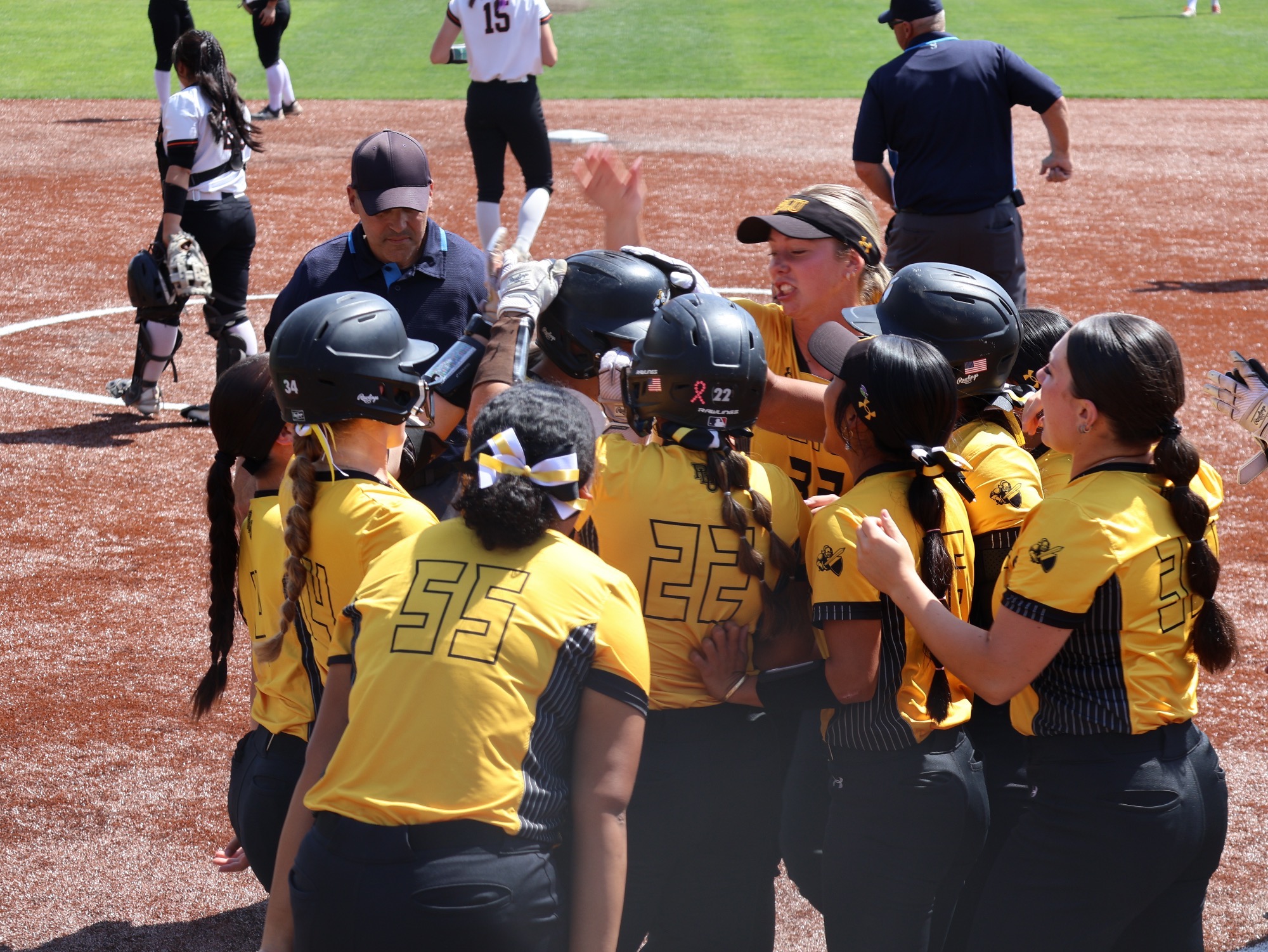 Celebrating Smithson HR in NWC Tourney win over Lewis & Clark