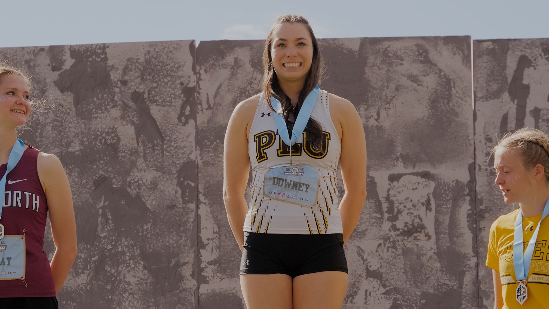 Madison Downey on the podium after winning TJ at NWC Meet