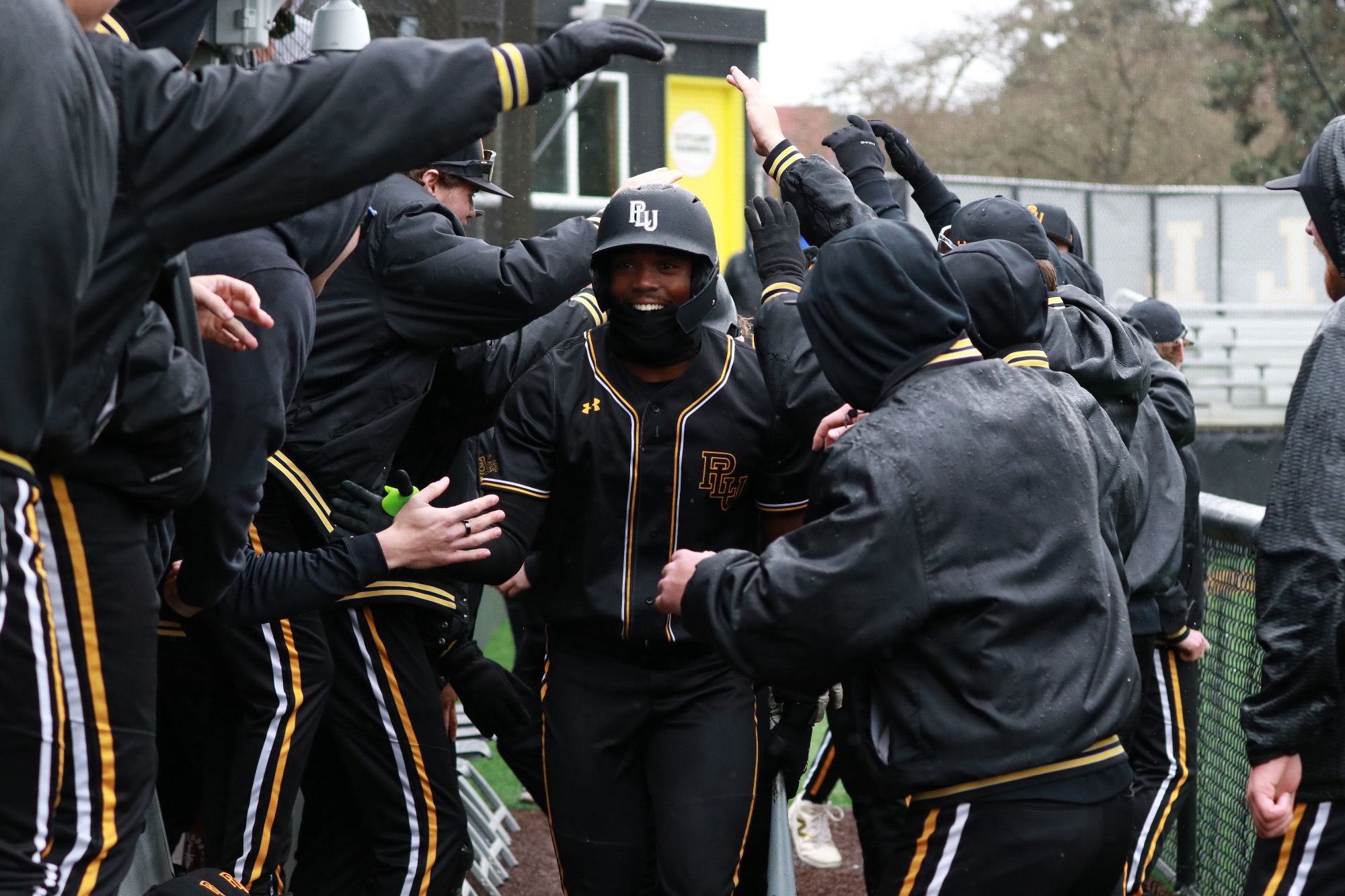 Asa Reese in dugout versus George Fox