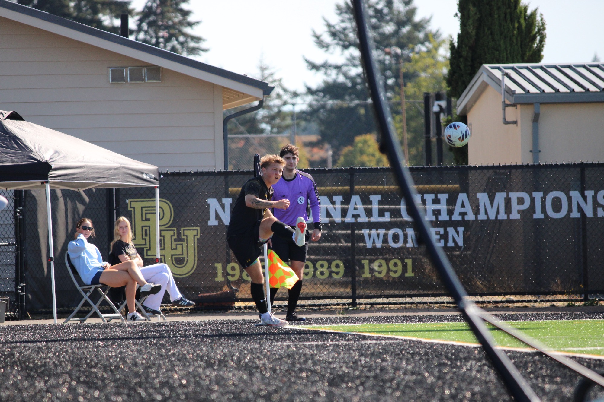 Ty Brunner taking a corner kick in win over Lake Forest