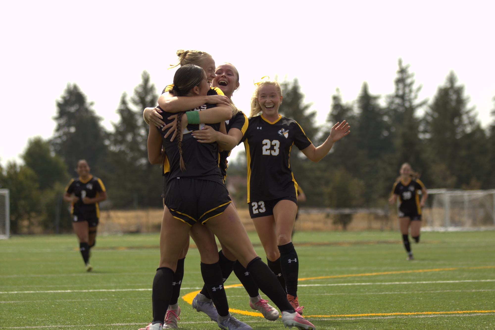 Lutes celebrate Archer's goal vs Azusa Pacific