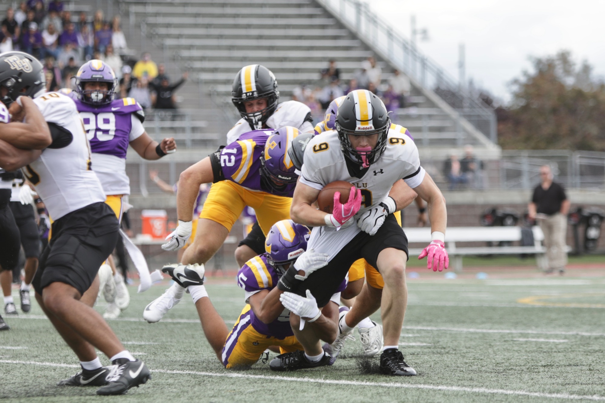 Sam Tracy carrying ball vs Cal Lu