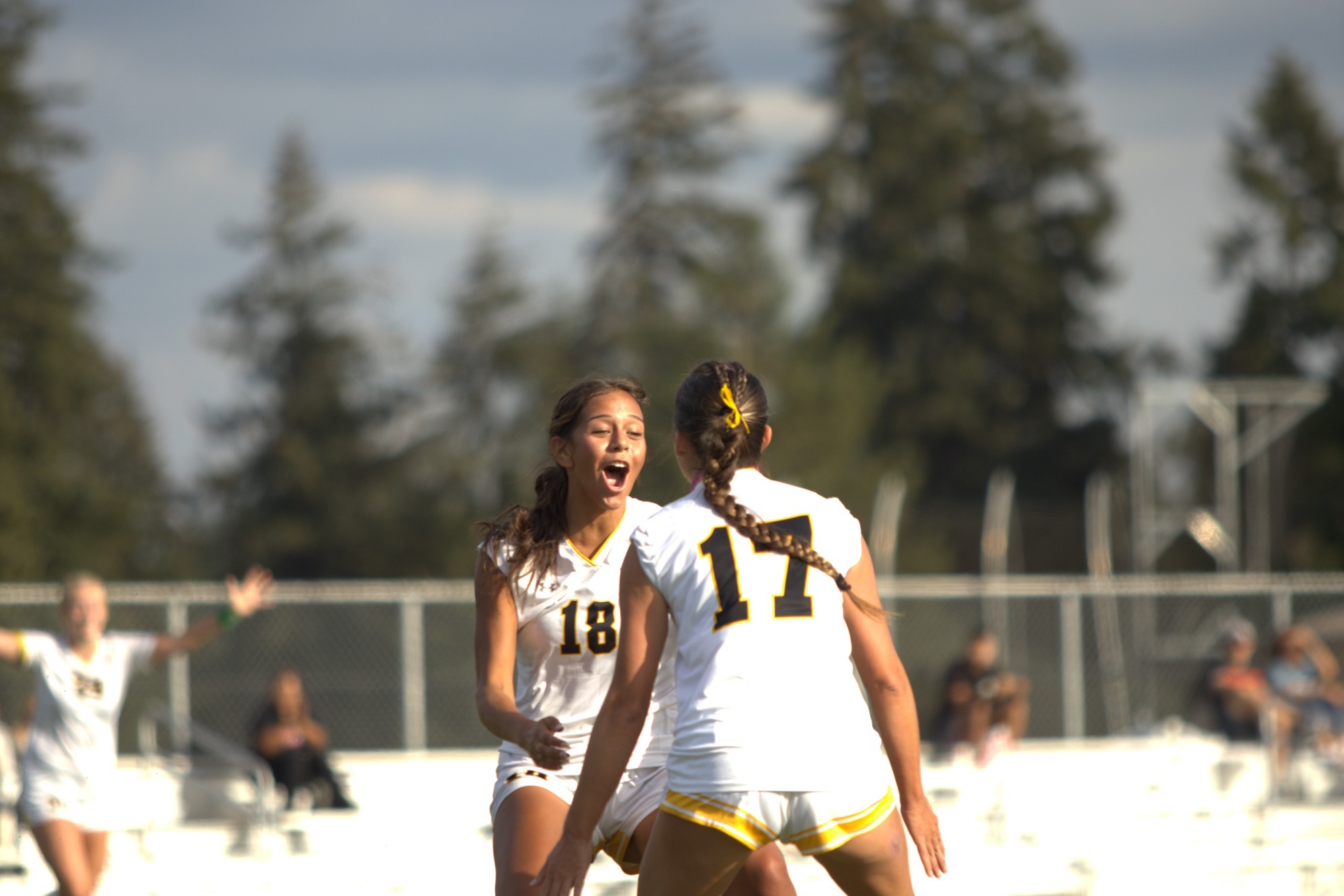 Elayna Blodgett celebrating with Taylor Thomas