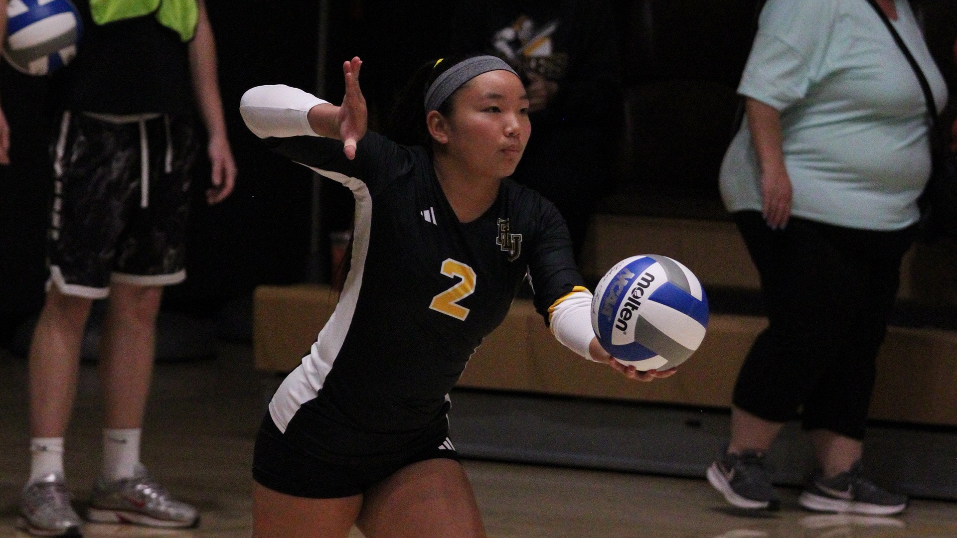 Macy Matsushima serves ball in win over UPS