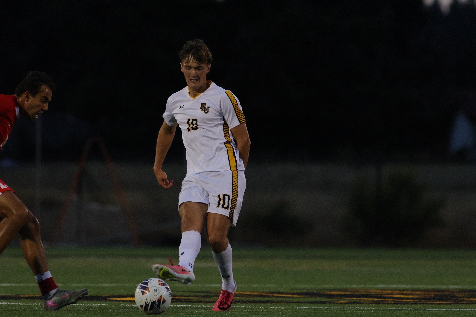 Connor O'Brien with the ball in season opener vs Chapman
