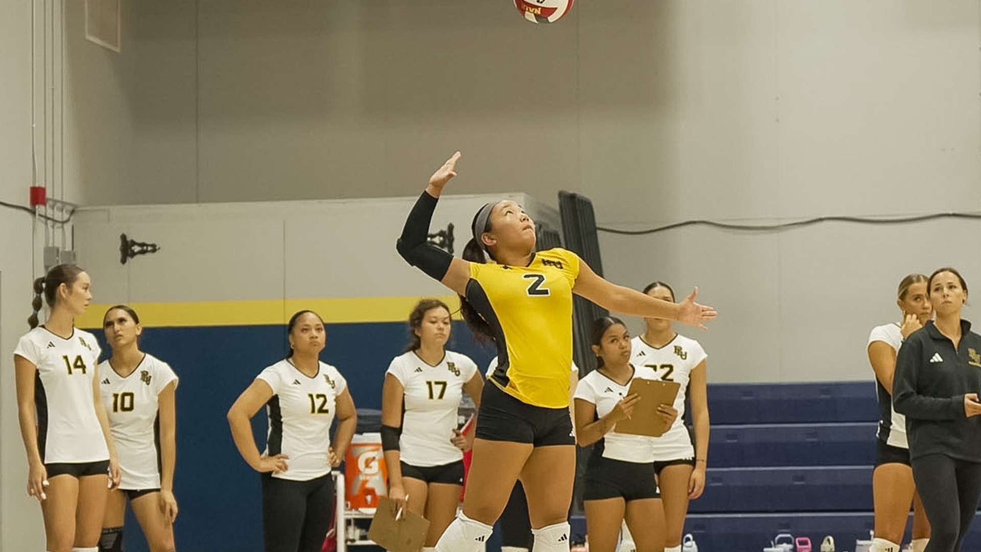 Macy Matsushima serving ball in win over Northwest