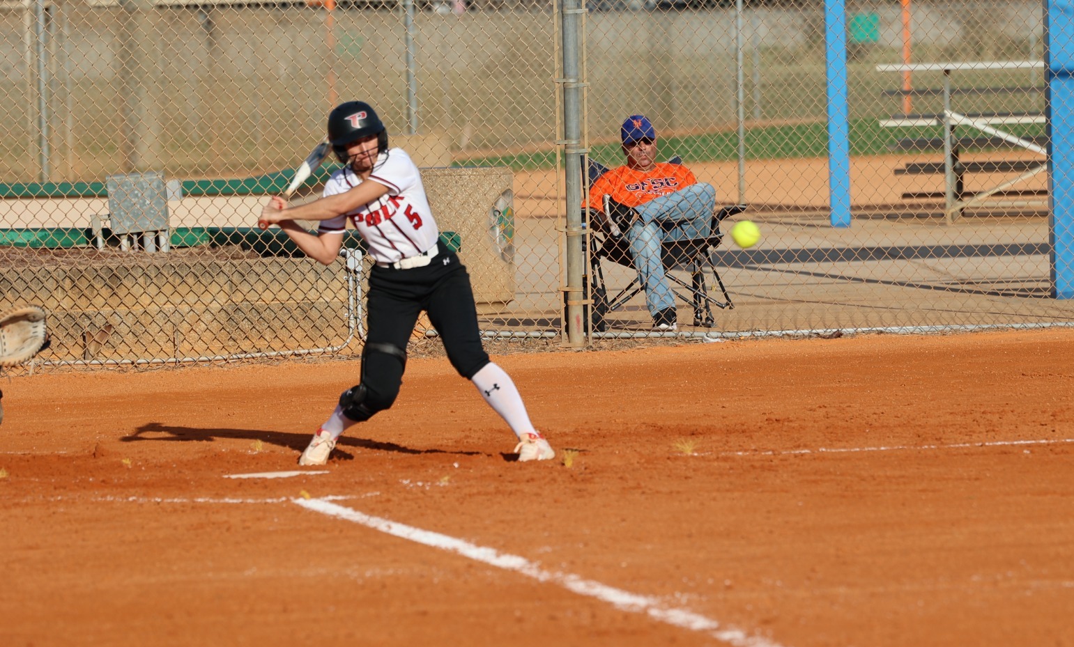 Chelsi Rae' Hebert swings against South Florida State College