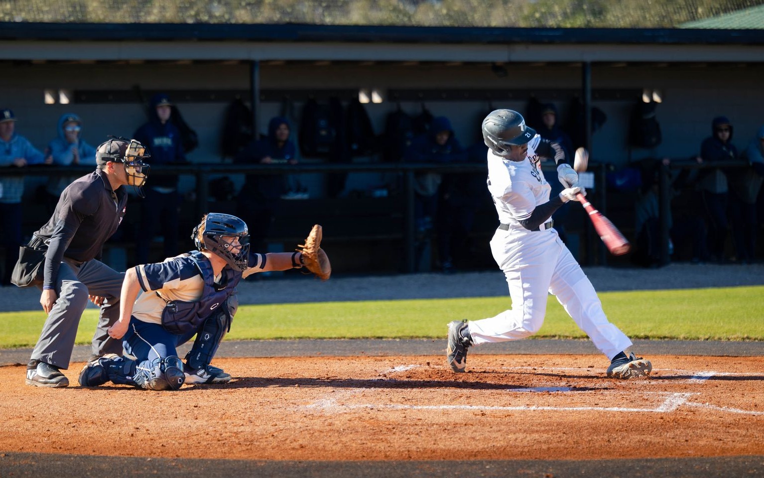 Kustarr Webb swings for Polk State vs. Hillsborough
