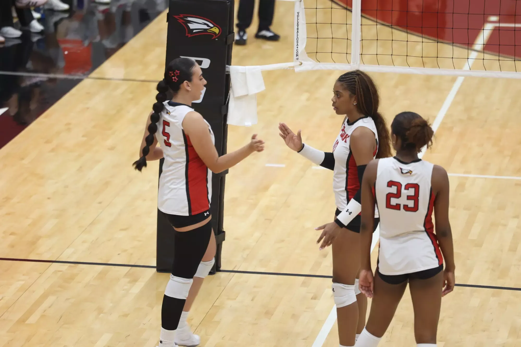 Mariana Castano and Adriauna Combs greet one another during a substitution for Polk State during a home match against Miami Dade College on Sept. 23, 2026.