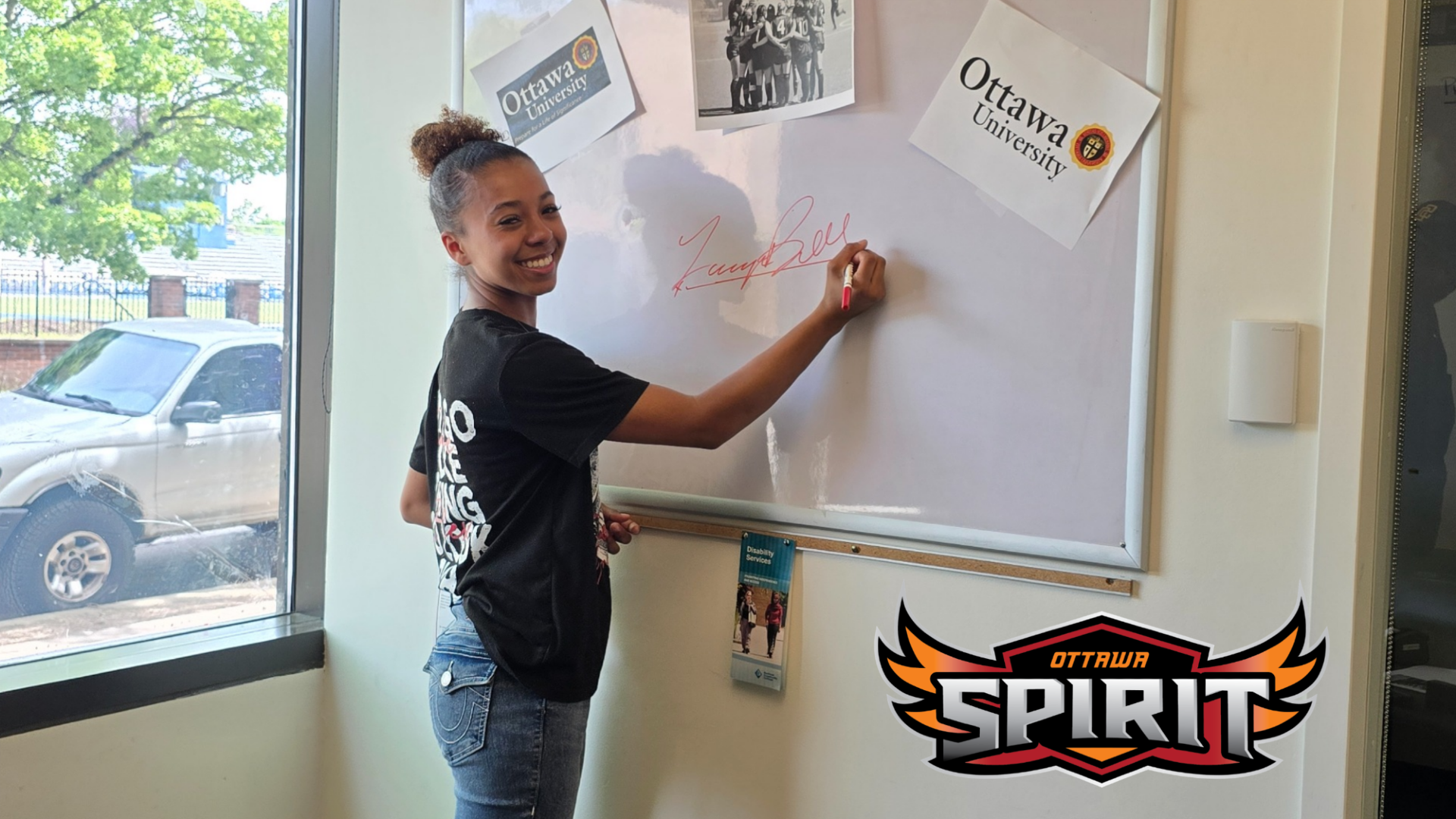 Photo of Lauryn Bell-Cabacungan signing with Ottawa University-Arizona
