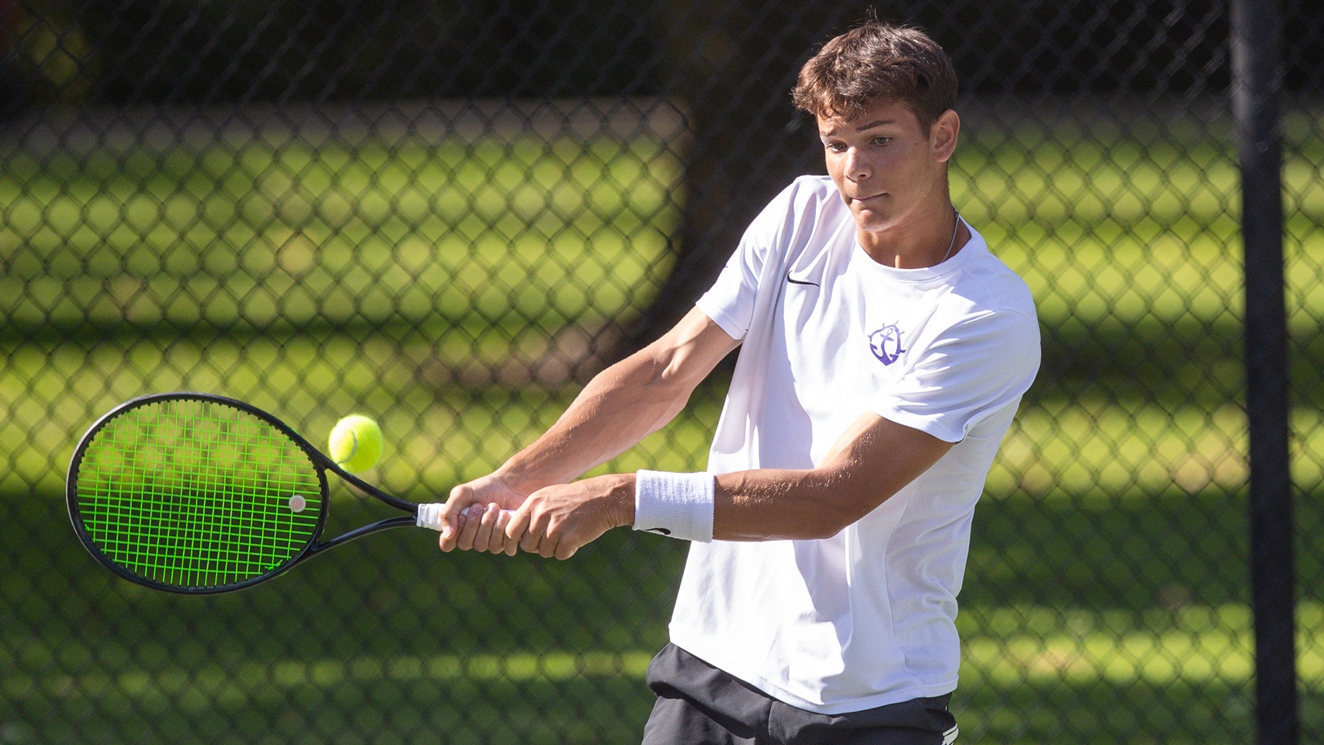 Cade Fernando hits a backhand during a match at the Dar Walters Classic in Boise.