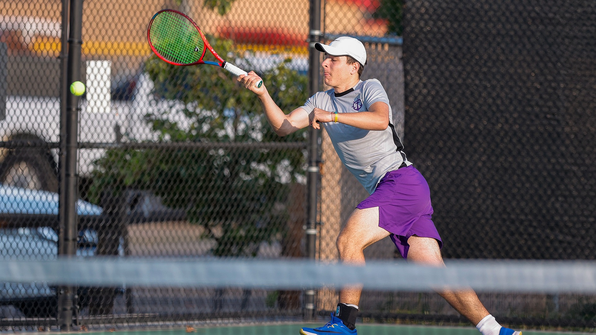 Lucas Kimelman hits a forehand runner in a fall 2025 match.