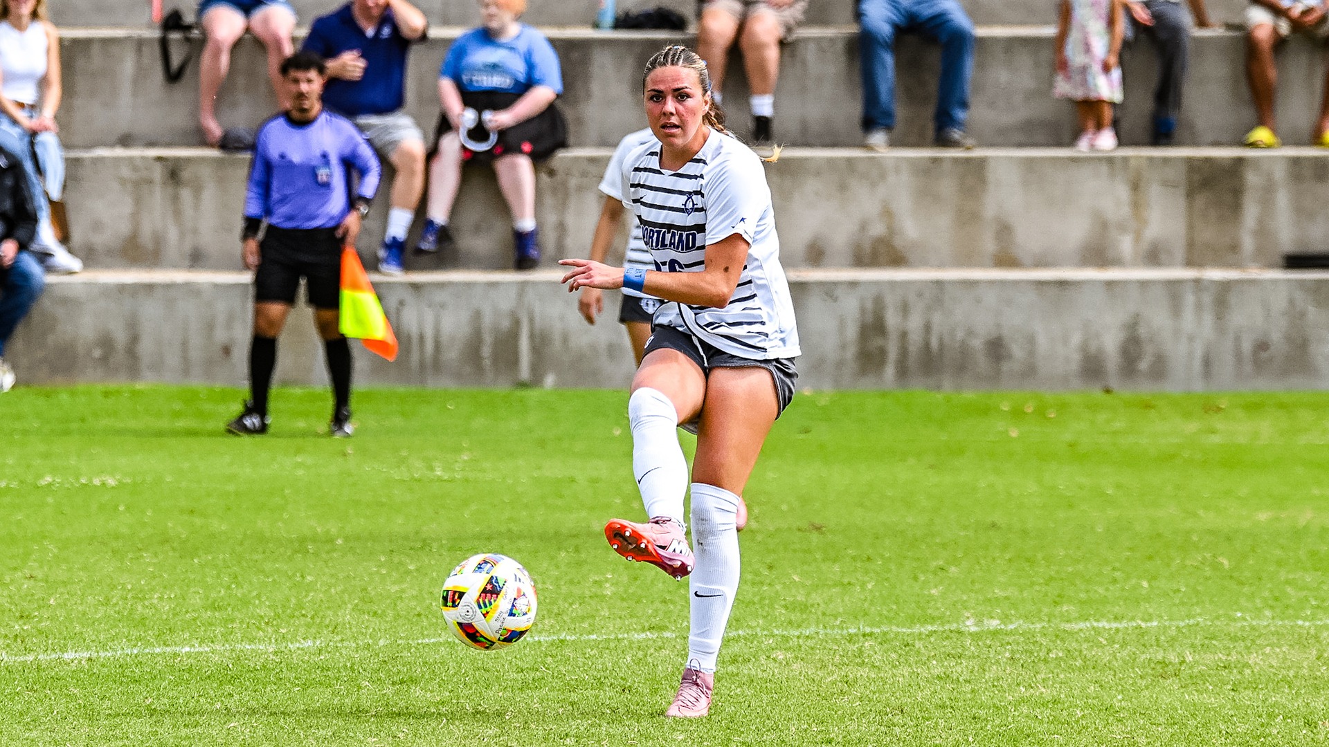 Violet Rademacher moves the ball downfield.