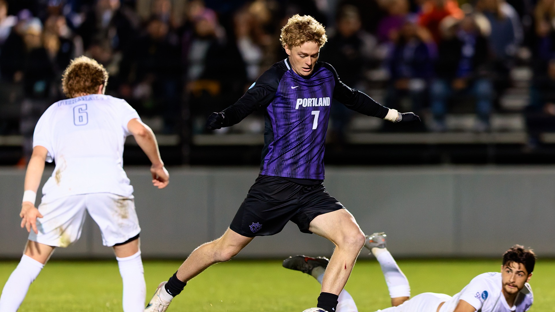 Joe Highfield launches a shot against Furman.