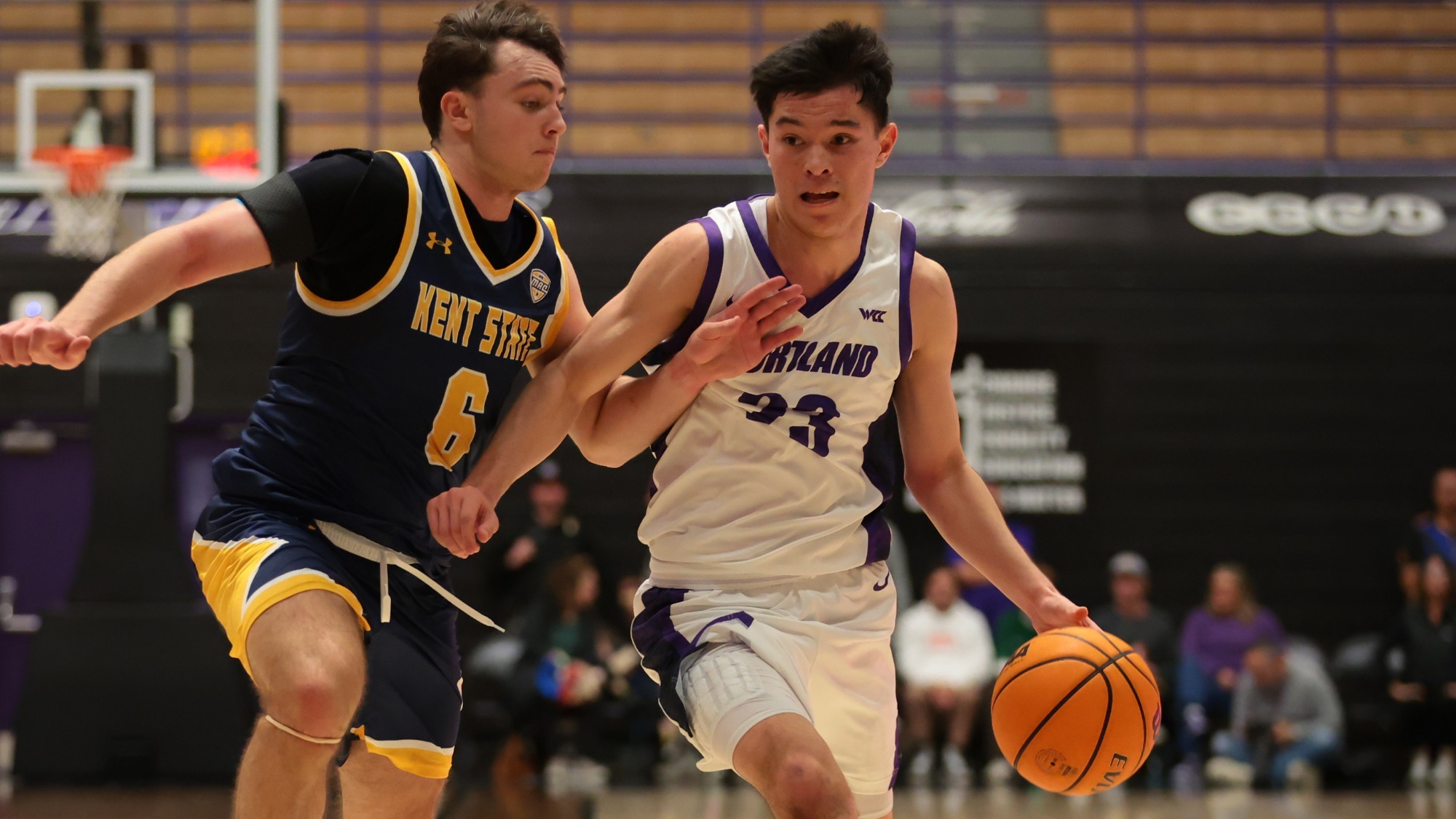 Joel Foxwell drives to the basket in a home game against Kent State at Chiles Center on Dec. 14, 2025.