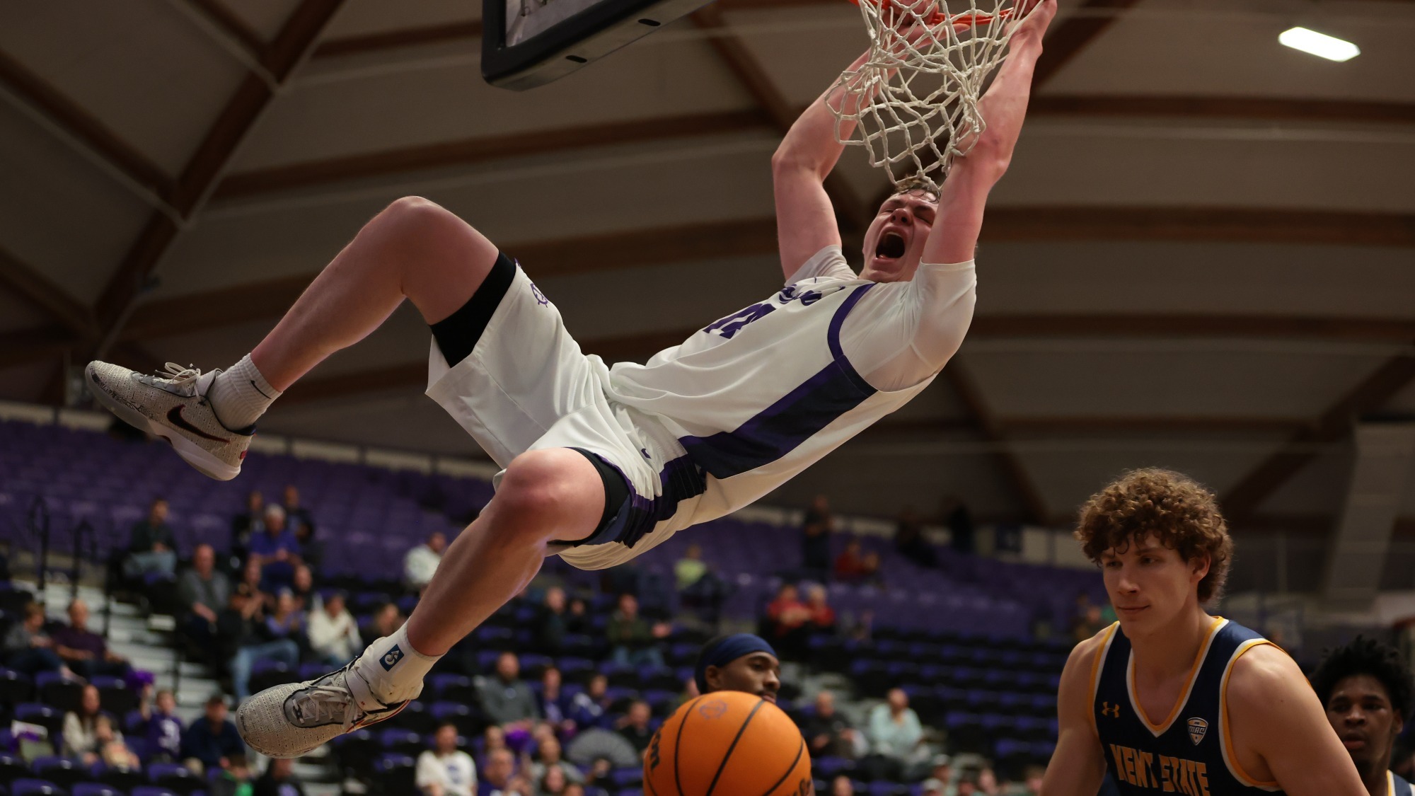 James O'Donnell dunks in a home game against KentState.