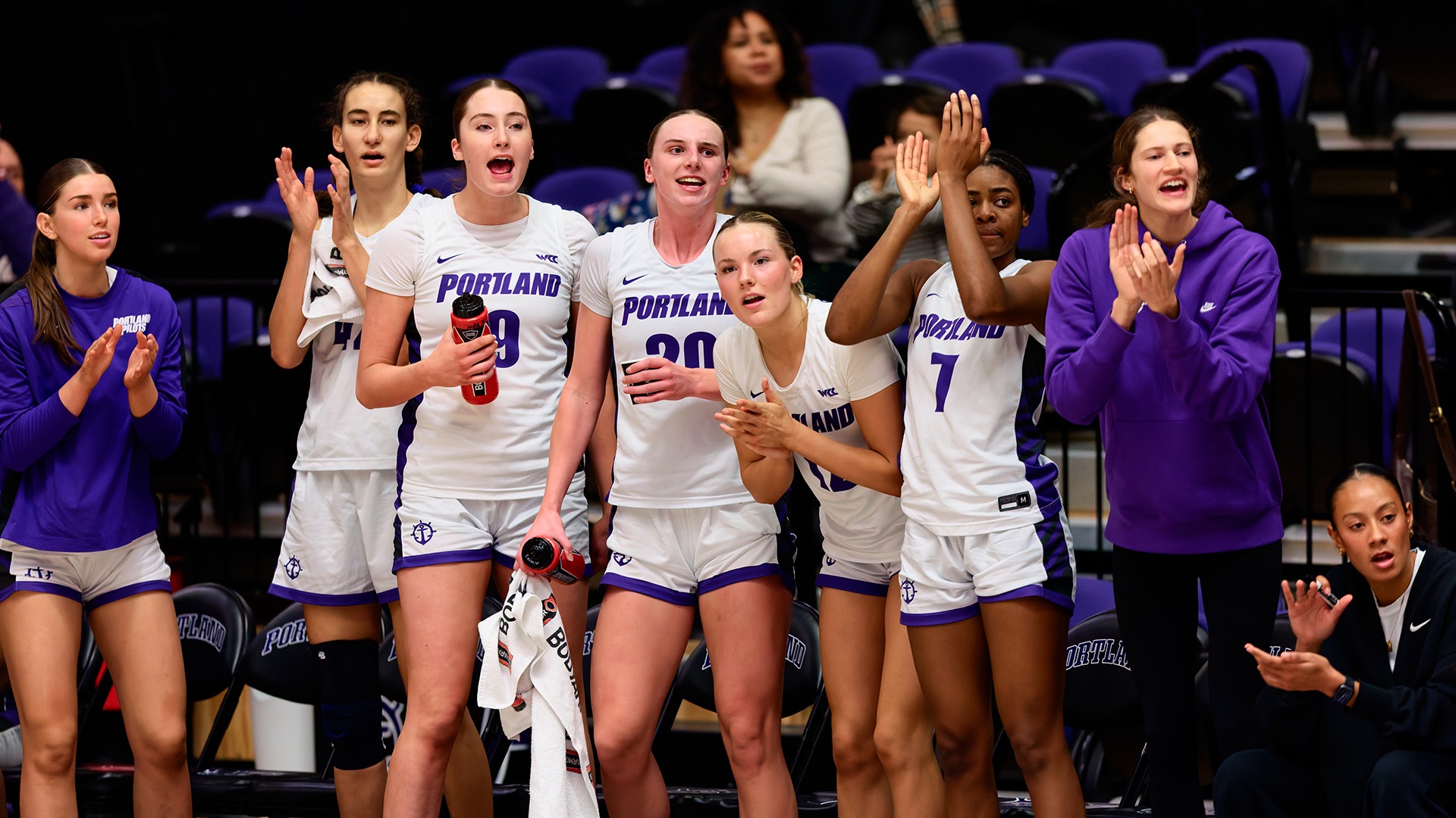 PORTLAND, OR - December 06, 2025 - The Portland Pilots bench during the game between the University of Portland Pilots and the Brigham Young University Cougars at Chiles Center in Portland, OR.