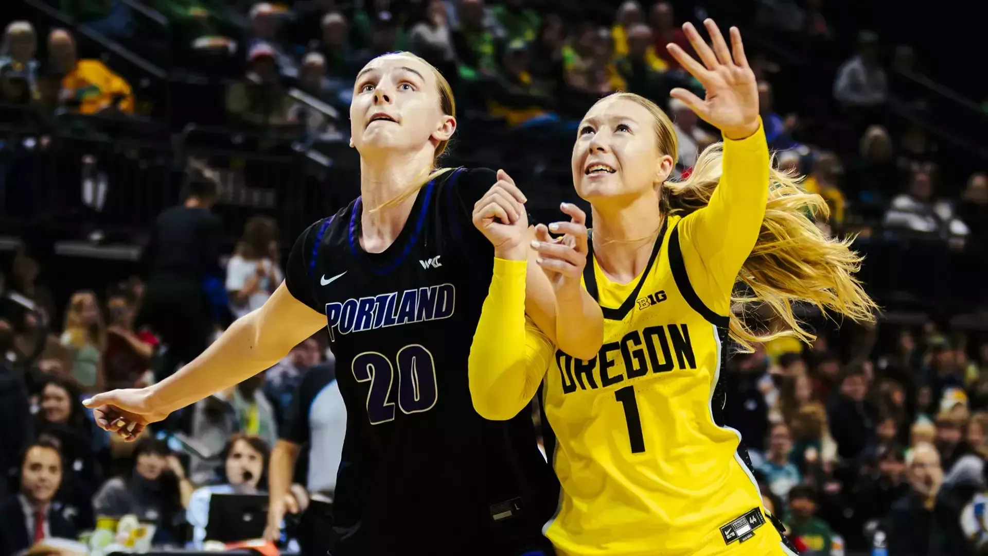 Lainey Spear battles in the post for a rebound.