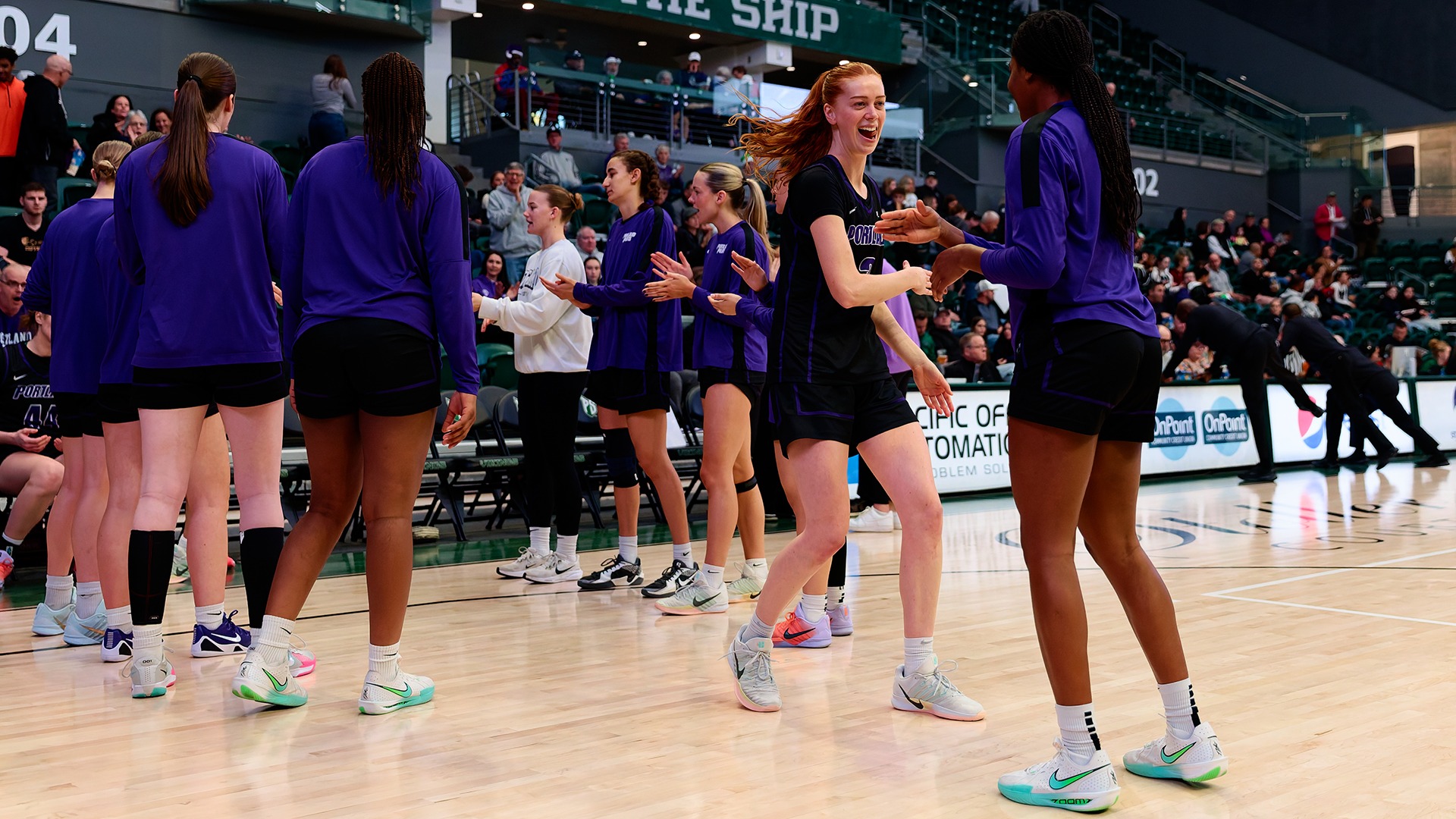 Florence Dallow shakes the hand of the Tiffany Barbosa before their contest against Portland State.