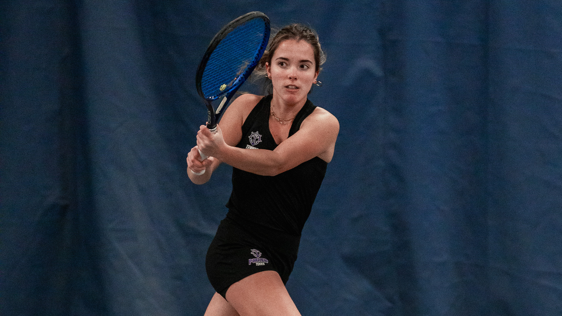 Nadine Arbaizar Martinez hits a backhand in a home match vs. Portland State.