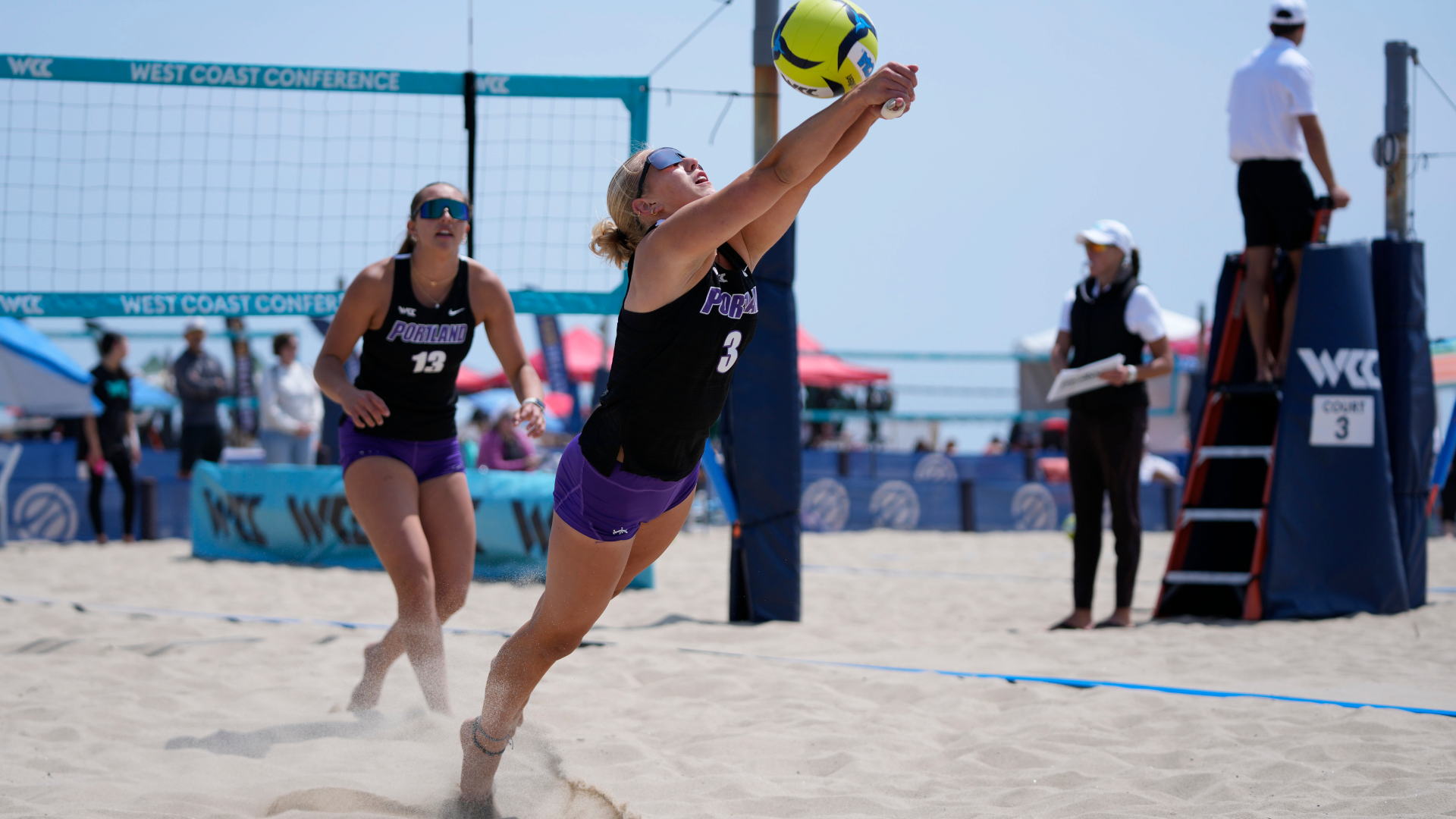Emily Wood diving to save the ball