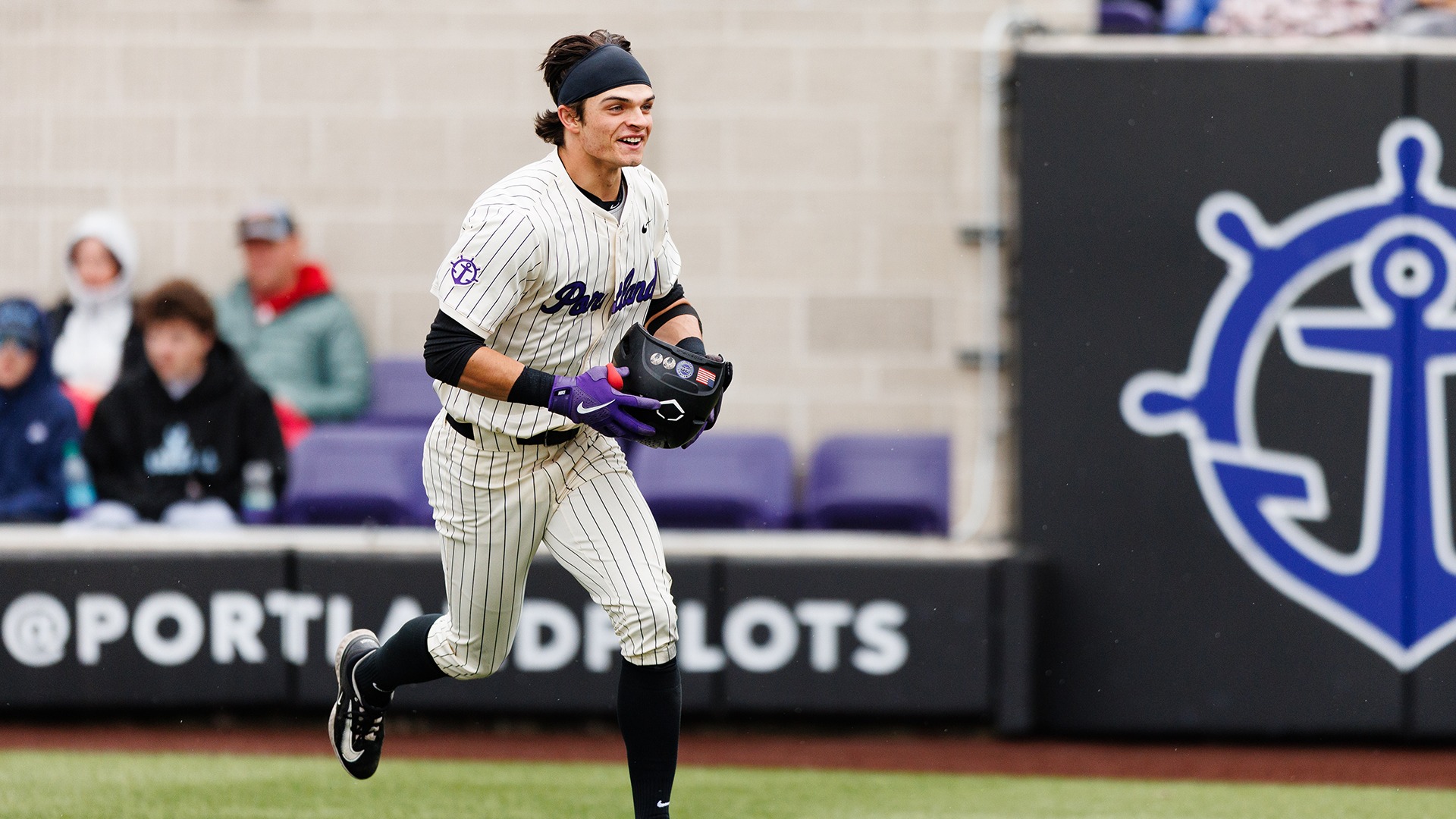 Curtis Hebert celebrates his home run.