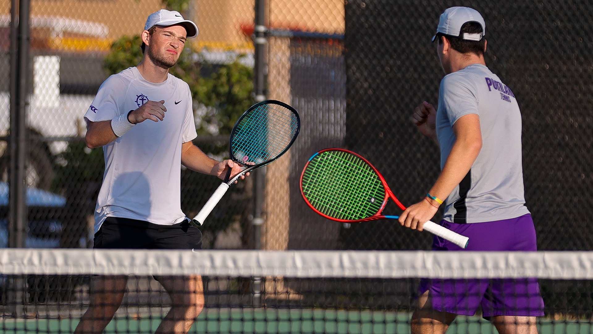 Tannor Binder and Lucas Kimelman celebrate a doubles point at the Dar Walters Classic in Boise, Idaho.