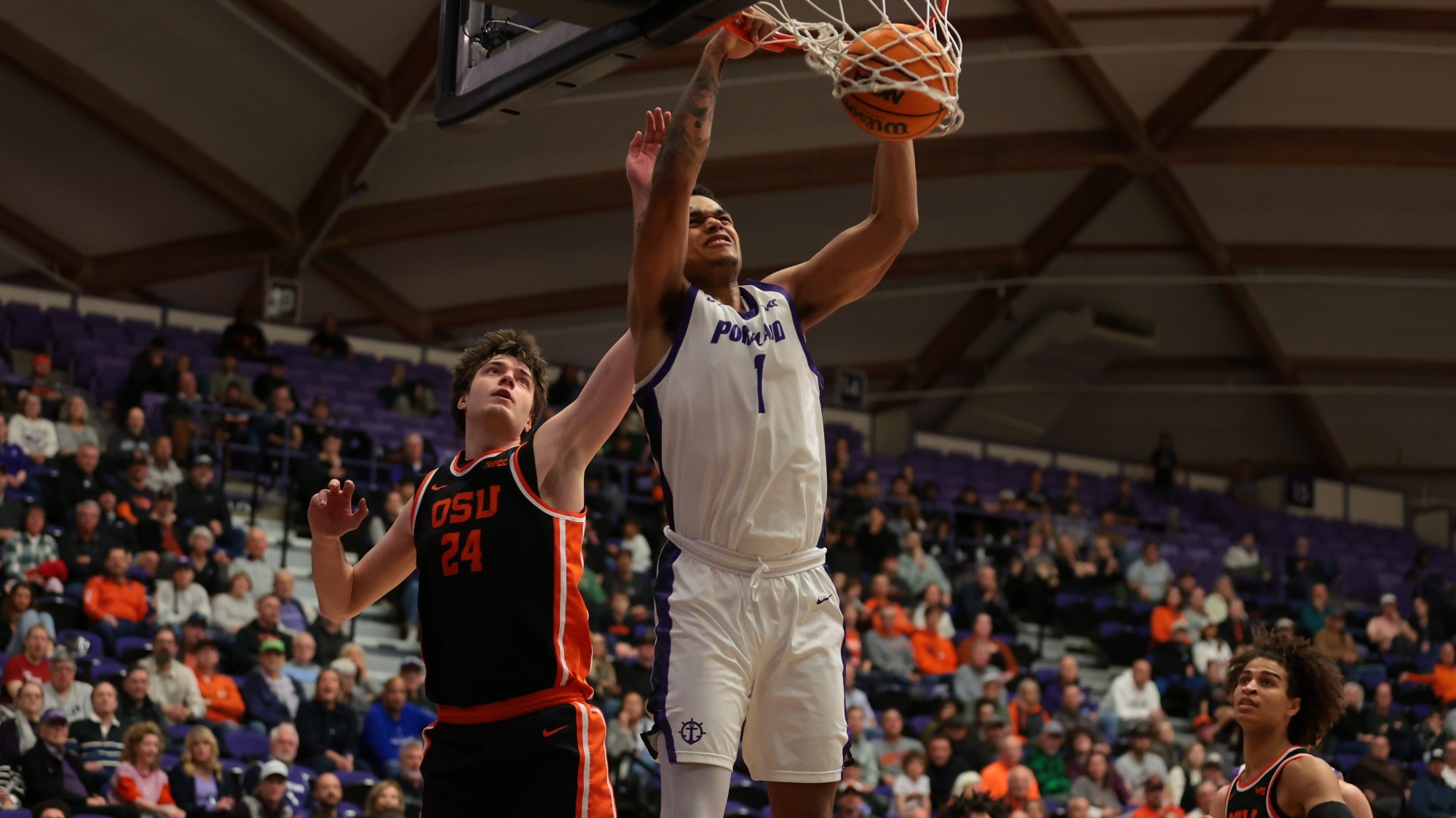 Jermaine Ballisager Webb dunks in a home win against Oregon State.