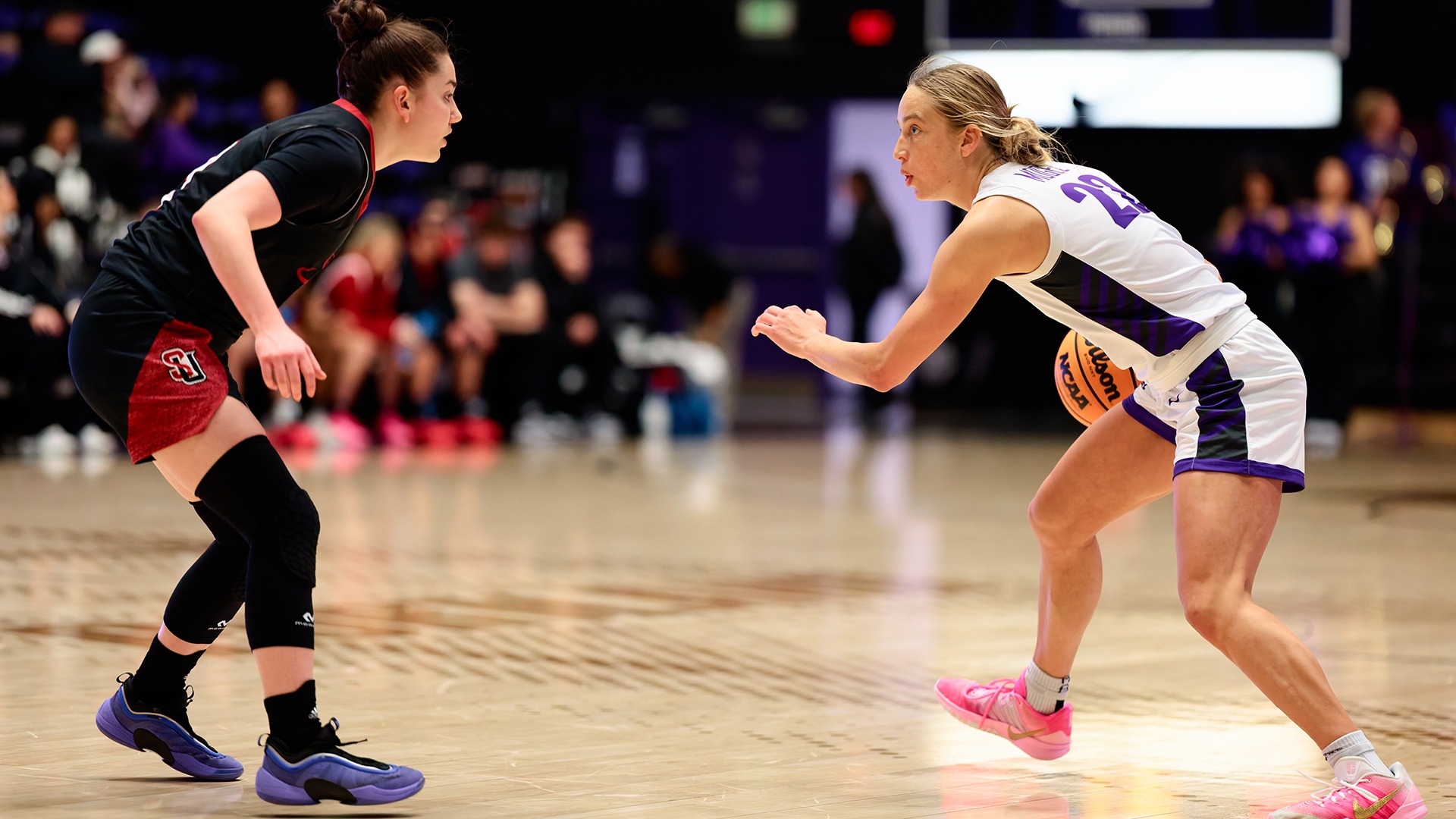 Rhyan Mogel sizes up her defender on Seattle U.